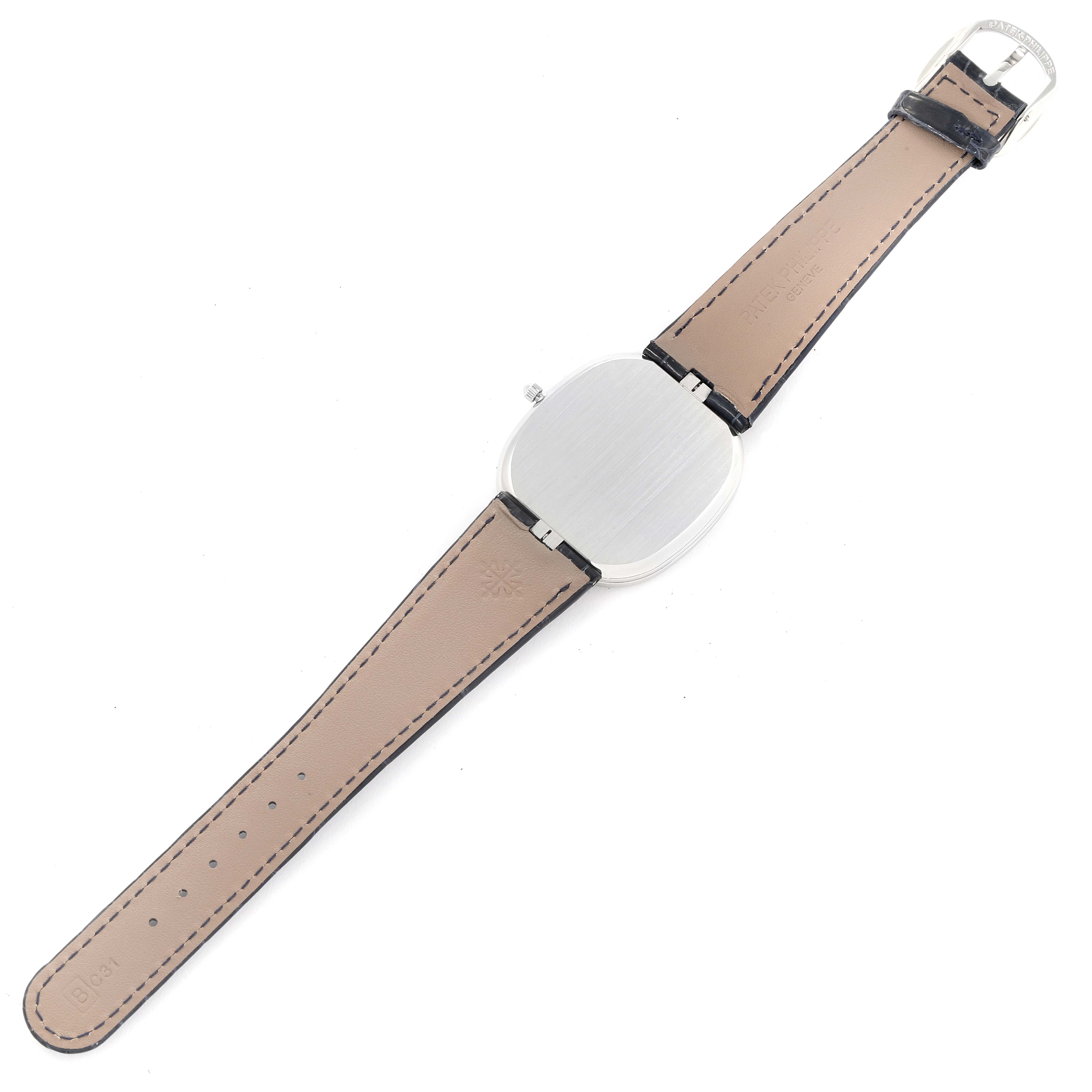 The image shows the back and leather strap of a Patek Philippe Golden Ellipse 5738P-001 Men's Platinum Blue Dial 5738P-001 Men's Platinum Blue Dial watch laid flat.