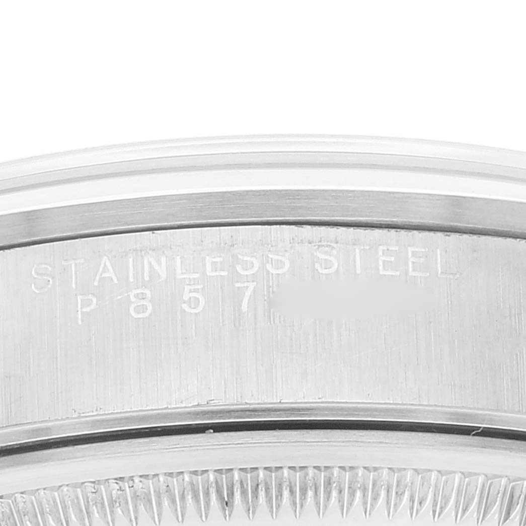 This image shows the side and back encasing of a Rolex Air-King 14000 Men's Stainless Steel White Dial 14000 Men's Stainless Steel White Dial watch, highlighting its stainless steel material and part of its serial number.