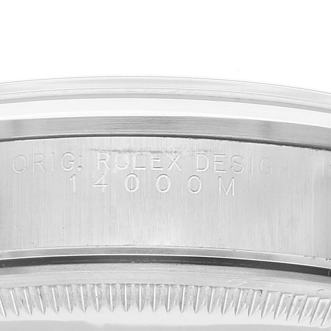 This image shows a close-up of the serial engraving on the side of the Rolex Air-King 14000 Men's Stainless Steel White Dial 14000 Men's Stainless Steel White Dial model.