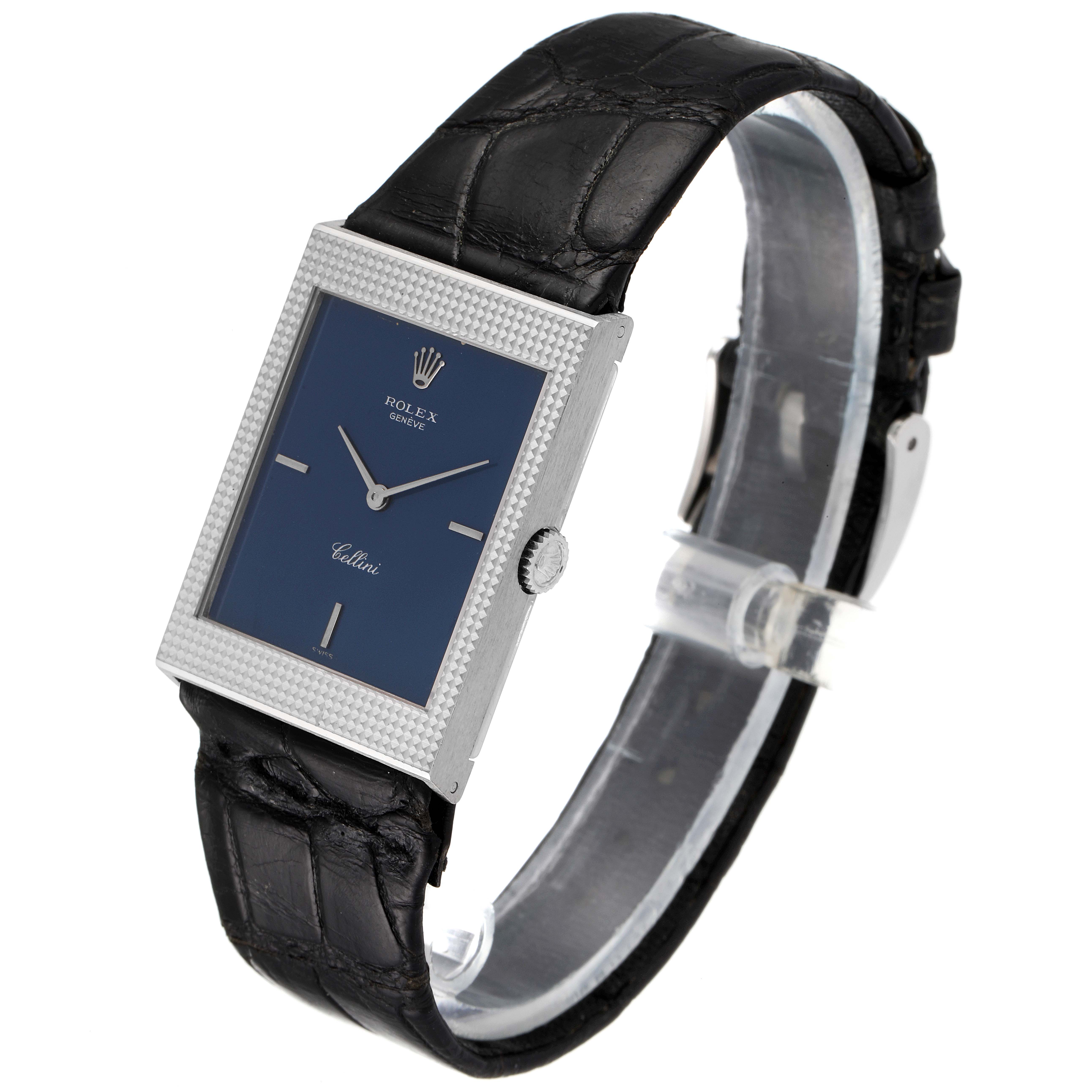 The Rolex Cellini 4127 Men
s White Gold Blue Dial 4127 Men
s White Gold Blue Dial model watch is shown from a slight angle, clearly displaying the dial, bezel, crown, and leather strap.