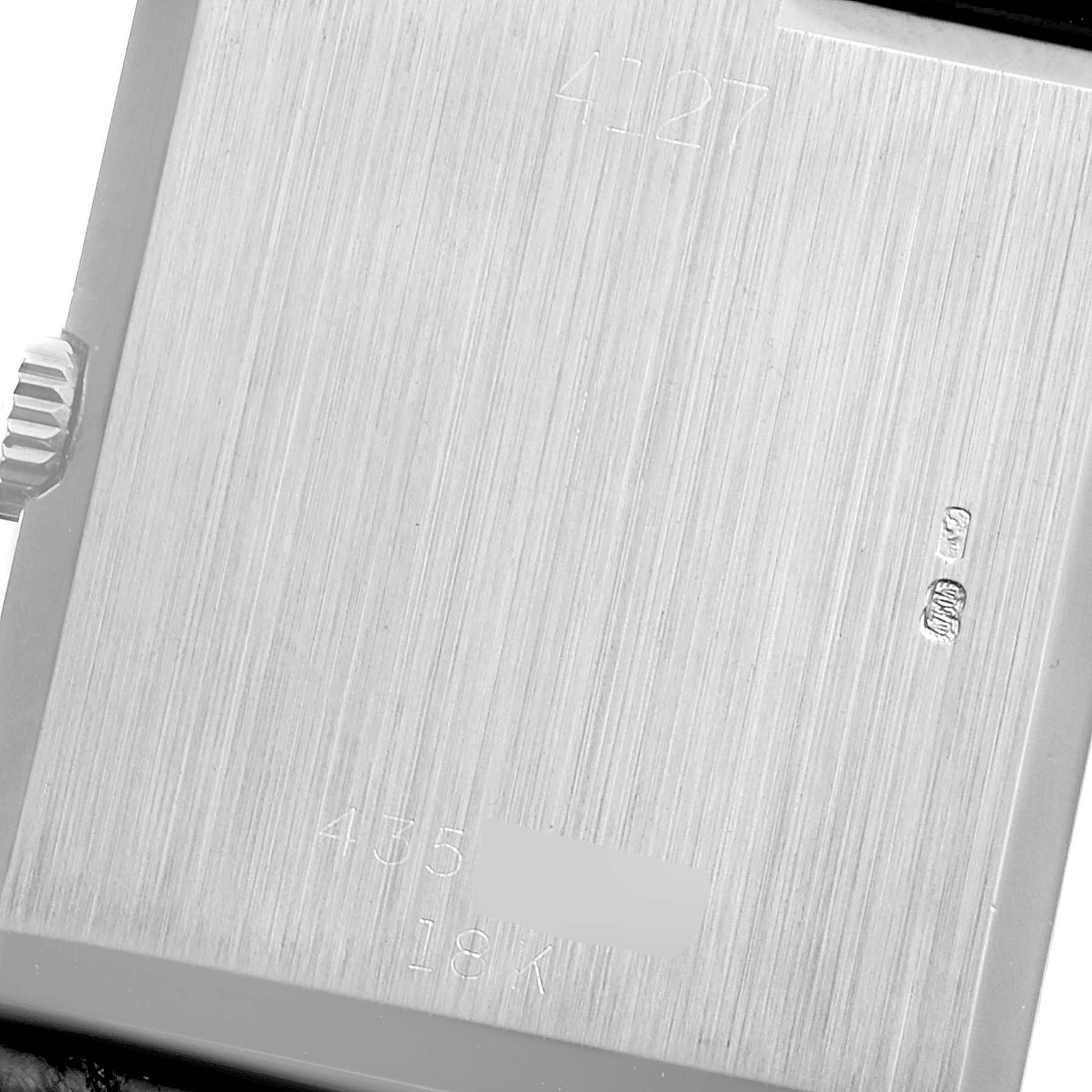 This image shows the back case and crown of a Rolex Cellini 4127 Men
s White Gold Blue Dial 4127 Men
s White Gold Blue Dial watch, featuring engraving details.