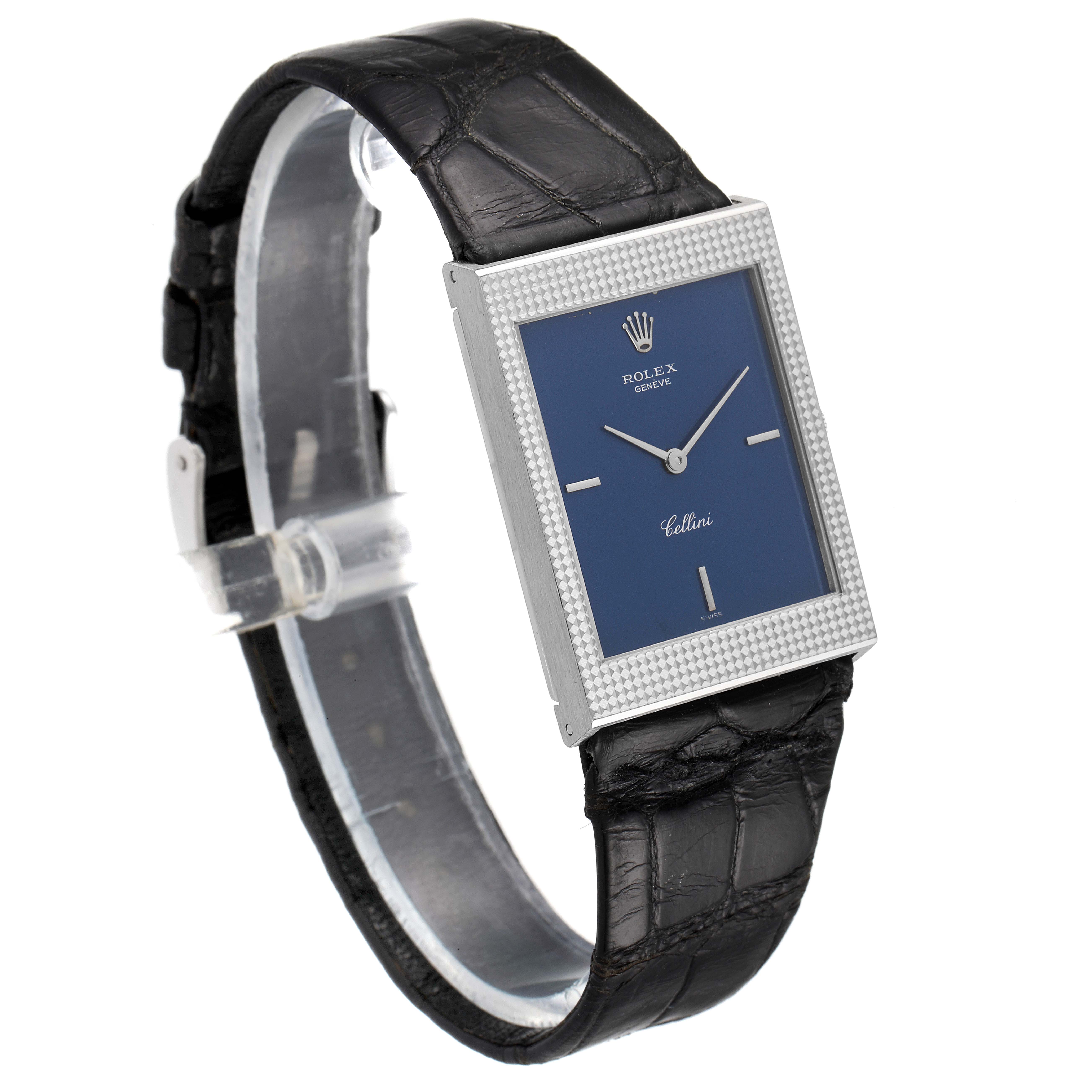 The image shows a side angle view of the Rolex Cellini 4127 Men
s White Gold Blue Dial 4127 Men
s White Gold Blue Dial watch, displaying its dial, bezel, and black leather strap.