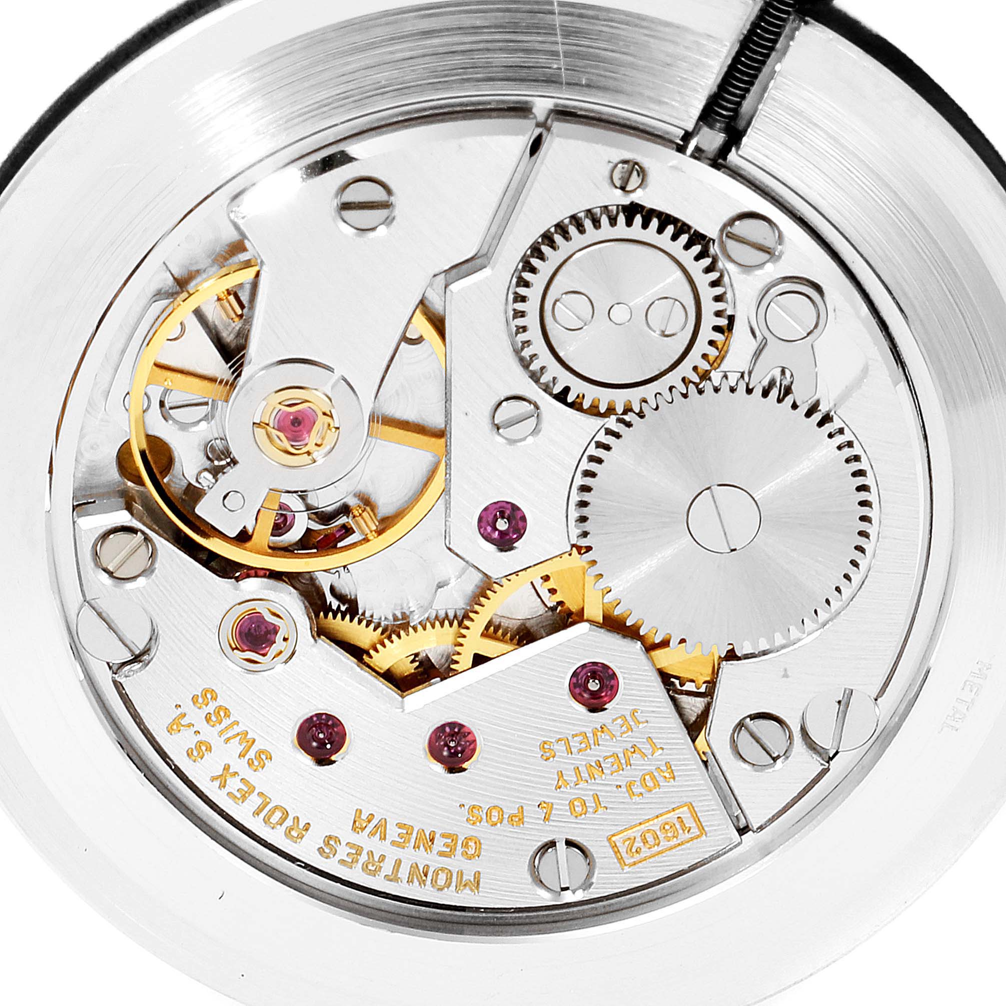 This image shows the intricate inner workings and mechanical movement of a Rolex Cellini 5112 Men's Yellow Gold White Dial 5112 Men's Yellow Gold White Dial model watch.