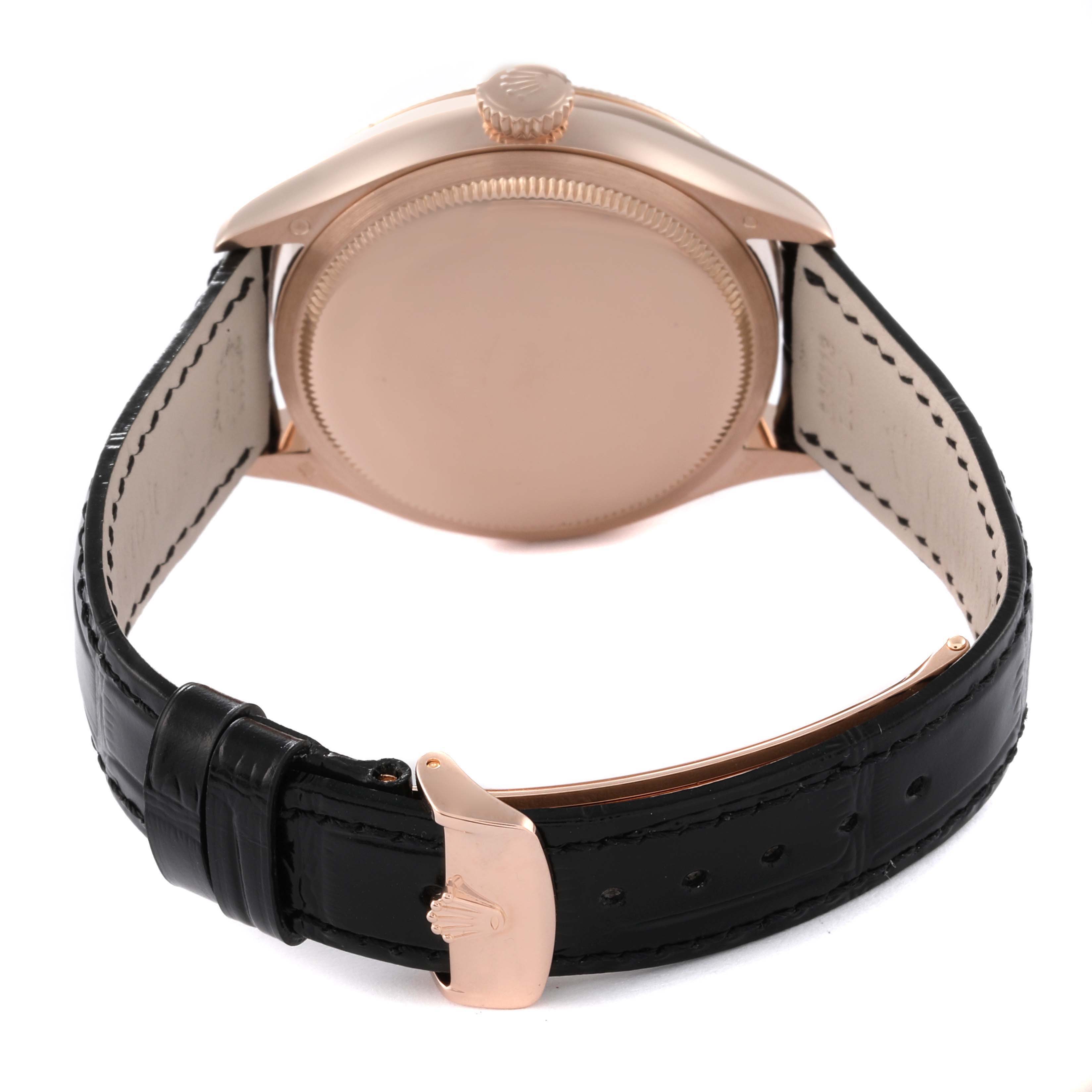 The image shows the back view of a Rolex Cellini 50535 Men's Rose Gold White Dial 50535 Men's Rose Gold White Dial watch, highlighting its case, crown, and black leather strap with a clasp.