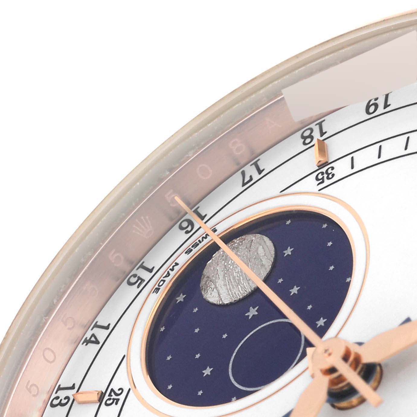 The image shows a close-up of the dial of a Rolex Cellini 50535 Men's Rose Gold White Dial 50535 Men's Rose Gold White Dial watch, highlighting its moonphase indicator and partial hour markers.