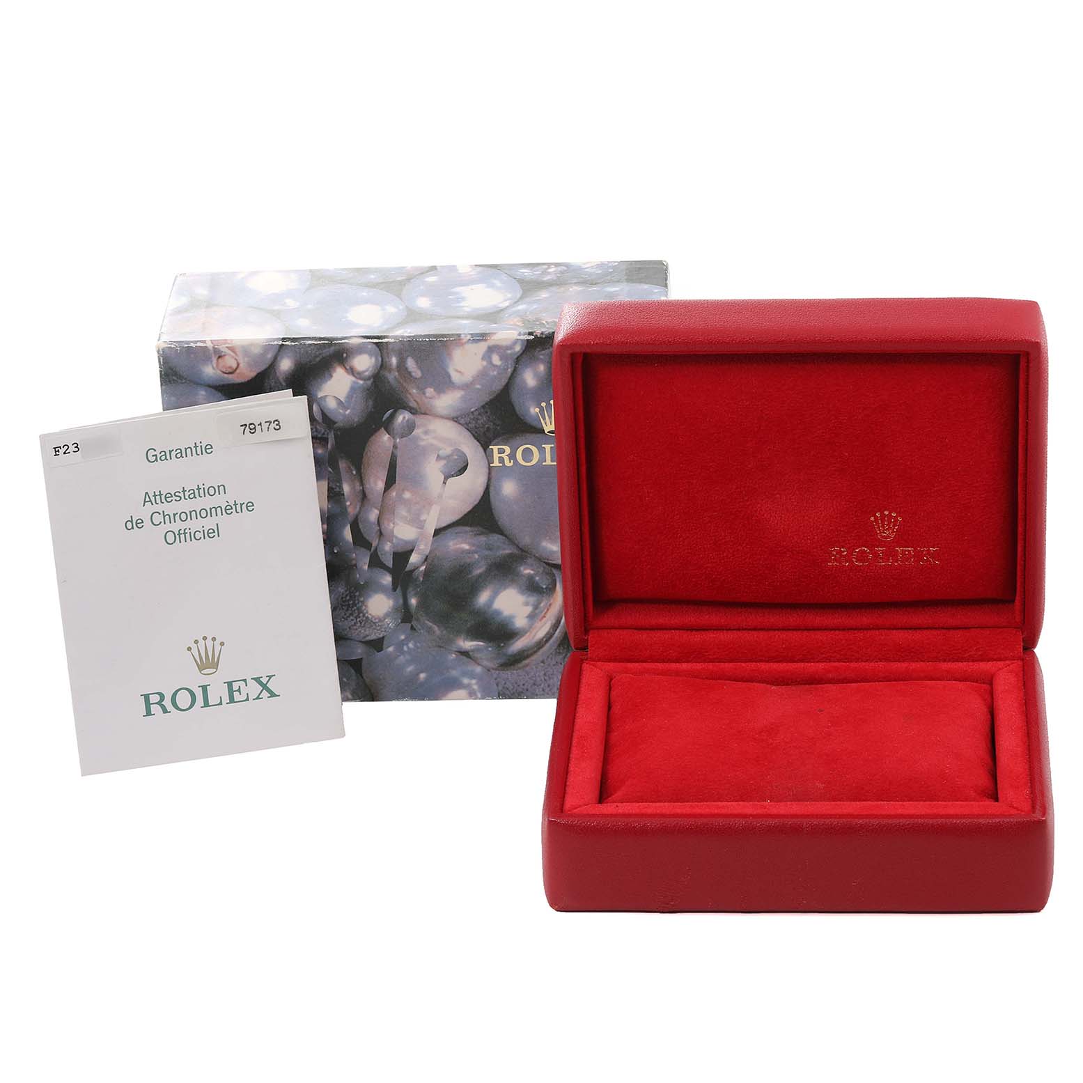 This image shows a Rolex Datejust 79173 Women
s Steel and Gold (two tone) White Dial 79173 Women
s Steel and Gold (two tone) White Dial
s open red velvet watch box, warranty card, and outer packaging from a front angle.