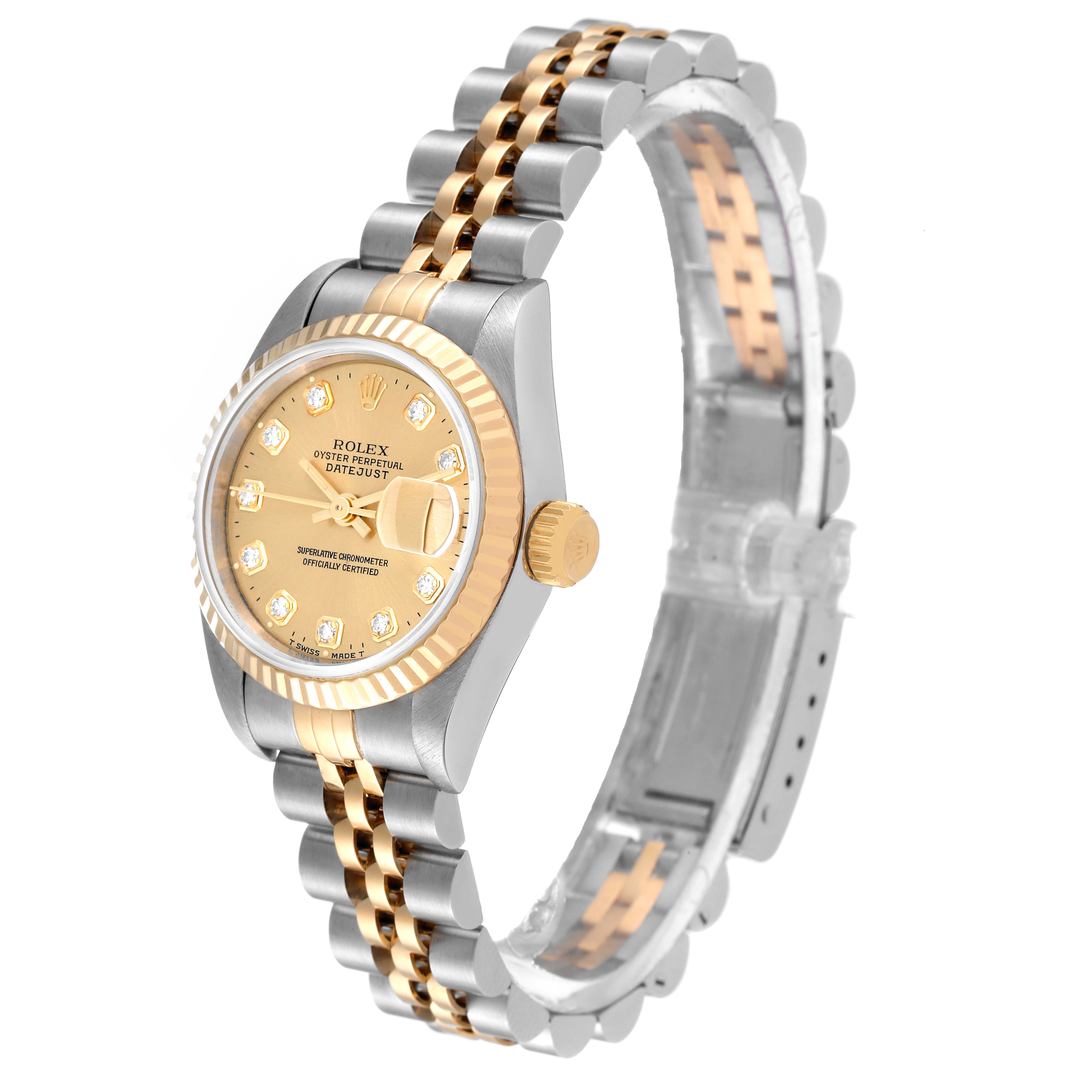 This image shows a Rolex Datejust 69173 Women's Steel and Gold (two tone) Champagne Dial 69173 Women's Steel and Gold (two tone) Champagne Dial watch with a gold and silver two-tone bracelet, fluted bezel, and a champagne dial with diamond markers, at a slight angle.