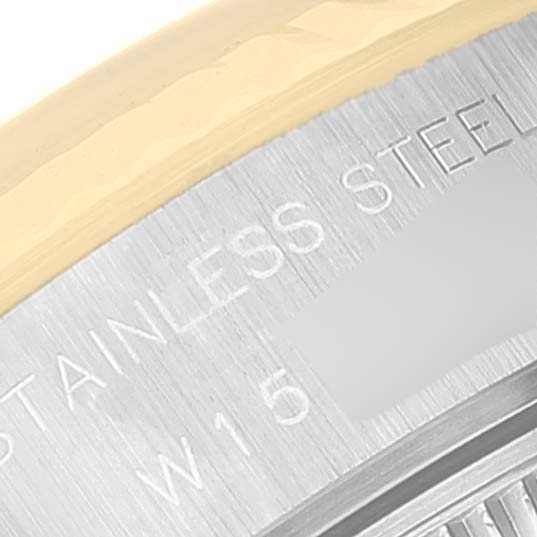 The image shows a close-up of the side and edge of the bezel of a Rolex Datejust 69173 Women's Steel and Gold (two tone) Champagne Dial 69173 Women's Steel and Gold (two tone) Champagne Dial watch, highlighting the "STAINLESS STEEL" engraving.