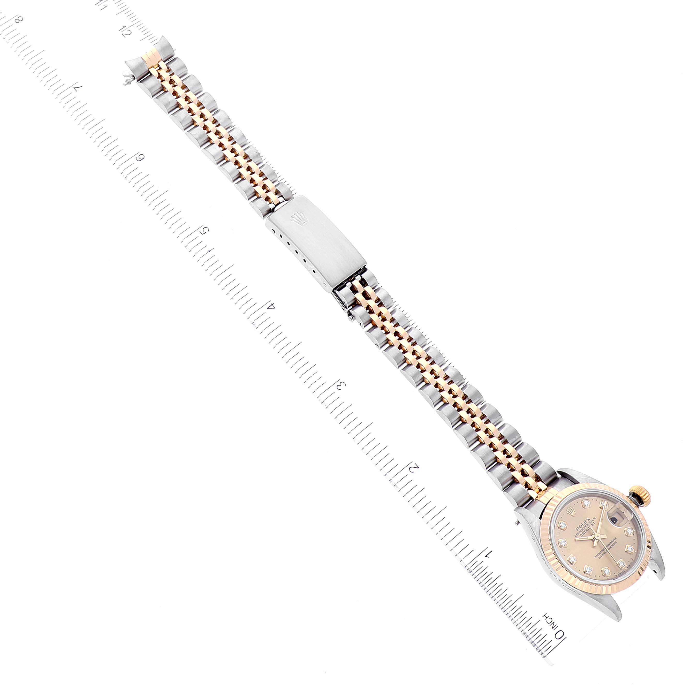 The image shows a Rolex Datejust 69173 Women's Steel and Gold (two tone) Champagne Dial 69173 Women's Steel and Gold (two tone) Champagne Dial watch laid flat, showcasing the dial, case, and the two-tone bracelet with a clasp.