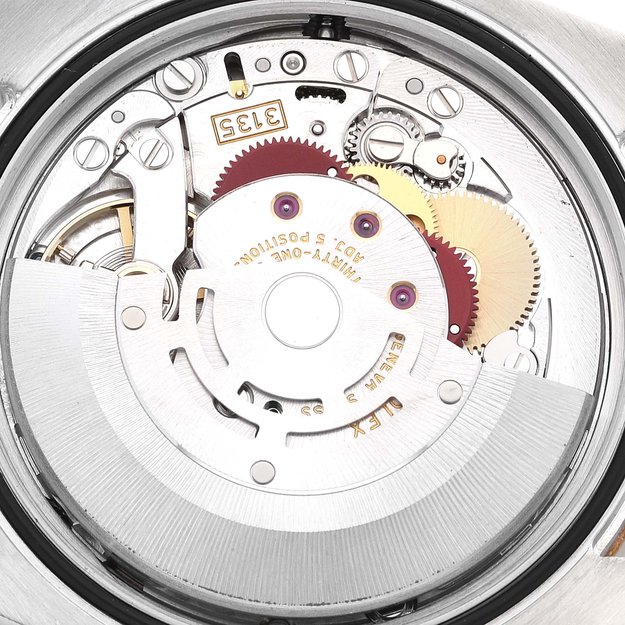 This image shows the inner mechanism and movement of the Rolex Datejust 116233 Men's Steel and Gold (two tone) Champagne Dial 116233 Men's Steel and Gold (two tone) Champagne Dial watch, viewed from the back case.