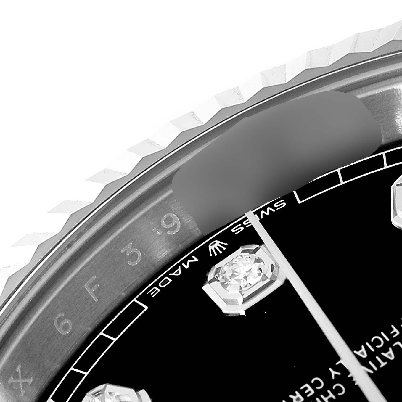 This image shows a close-up of the bezel and part of the dial of a Rolex Datejust 41 126334 Men
s Stainless Steel Black Dial 126334 Men
s Stainless Steel Black Dial watch.