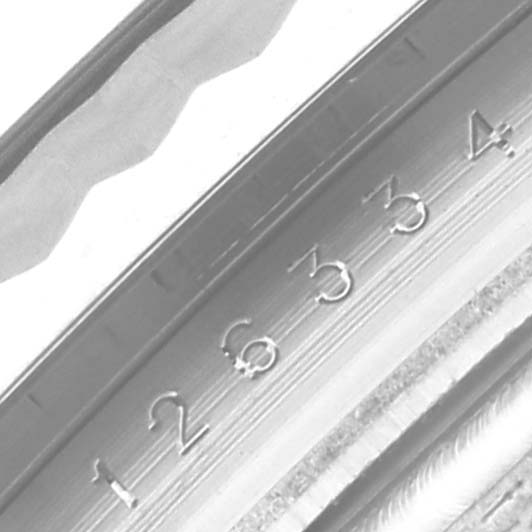 The image shows a close-up of the Datejust 41 Rolex
s etched rehaut with visible serial numbers.
