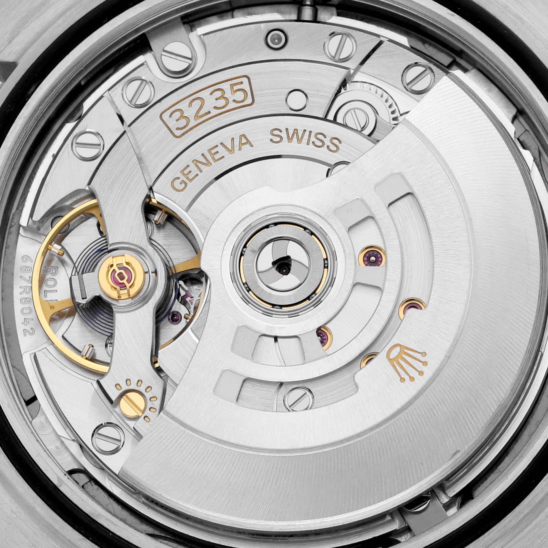 This image shows a close-up view of the Rolex Datejust 41 126334 Men
s Stainless Steel Grey Dial 126334 Men
s Stainless Steel Grey Dial model
s movement, featuring the intricate inner mechanisms and "GENEVA SWISS" engraving.