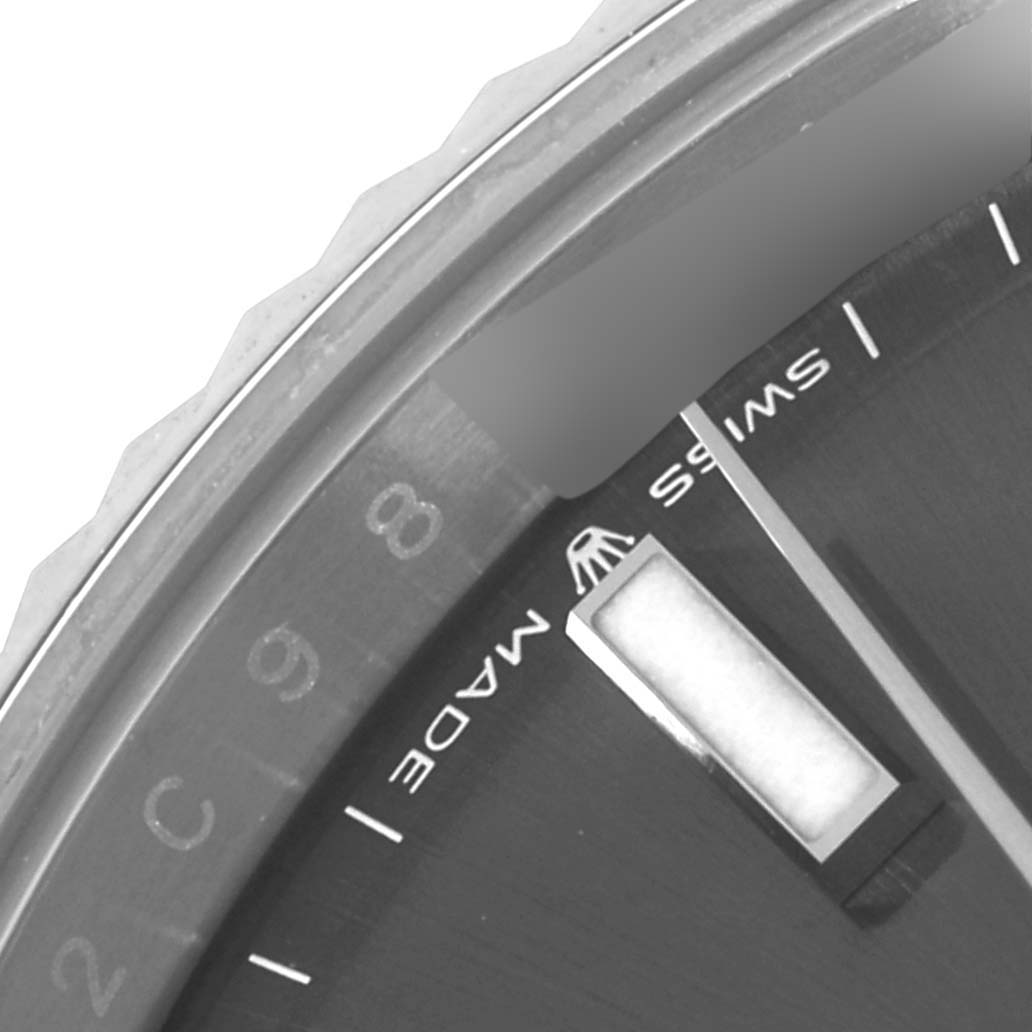 This image shows a close-up of the dial and bezel of a Rolex Datejust 41 126334 Men
s Stainless Steel Grey Dial 126334 Men
s Stainless Steel Grey Dial, highlighting the hour markers and text.
