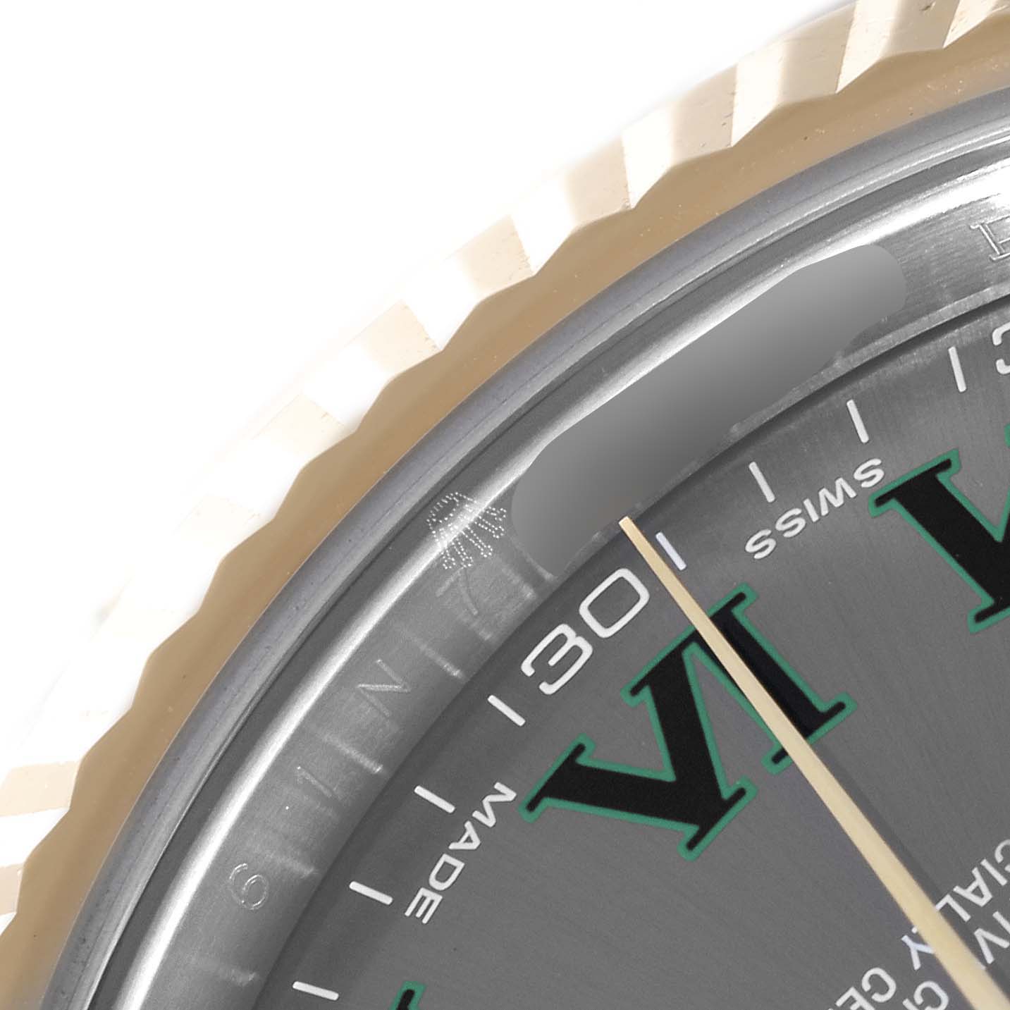 This image shows a close-up of the dial, bezel, and part of the minute hand of a Rolex Datejust 41 116333 Men's Steel and Gold (two tone) Grey Dial 116333 Men's Steel and Gold (two tone) Grey Dial watch.