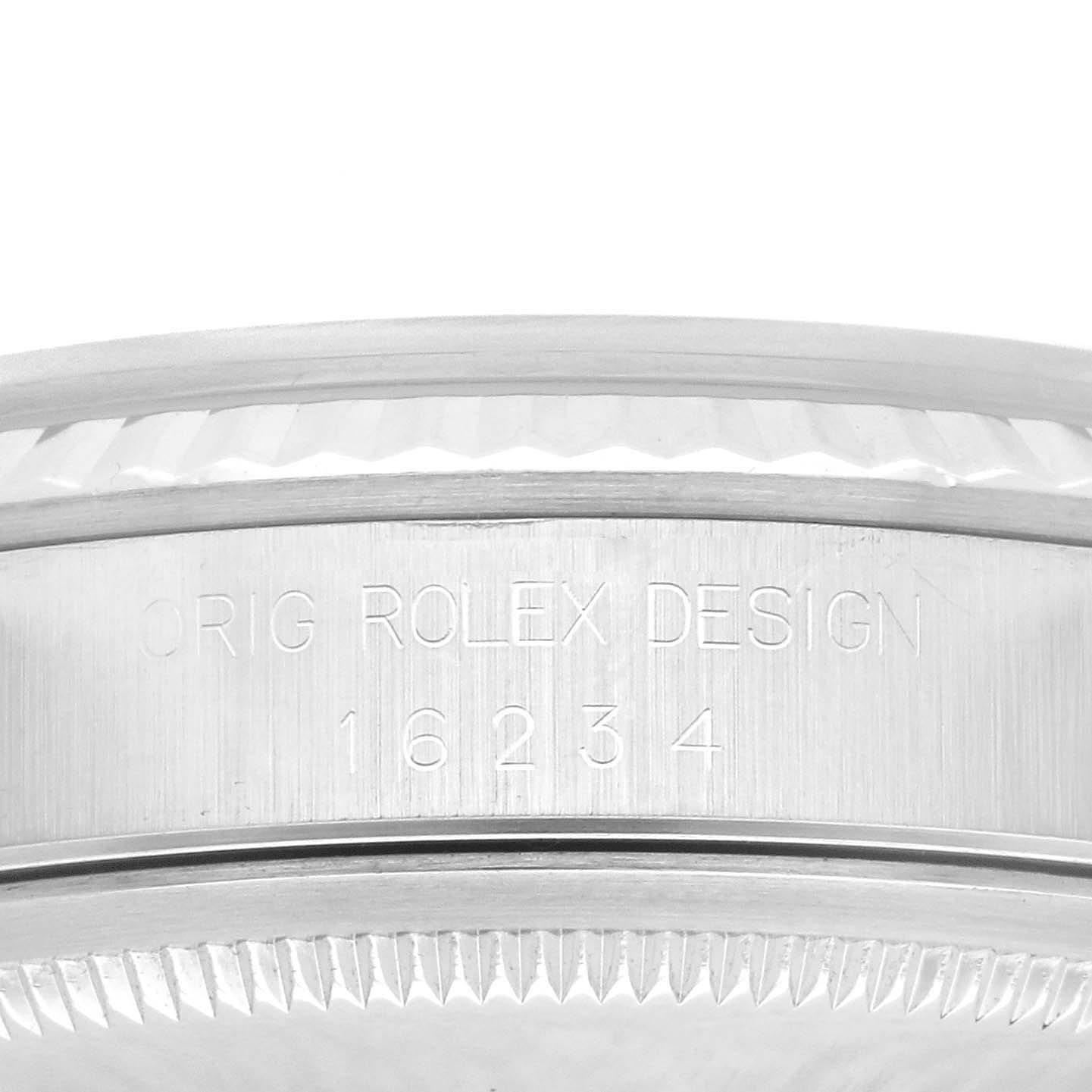 This image shows a close-up of the side of the bezel and case of a Rolex Datejust 16234 Men's Stainless Steel Black Dial 16234 Men's Stainless Steel Black Dial watch, displaying the model number 16234.