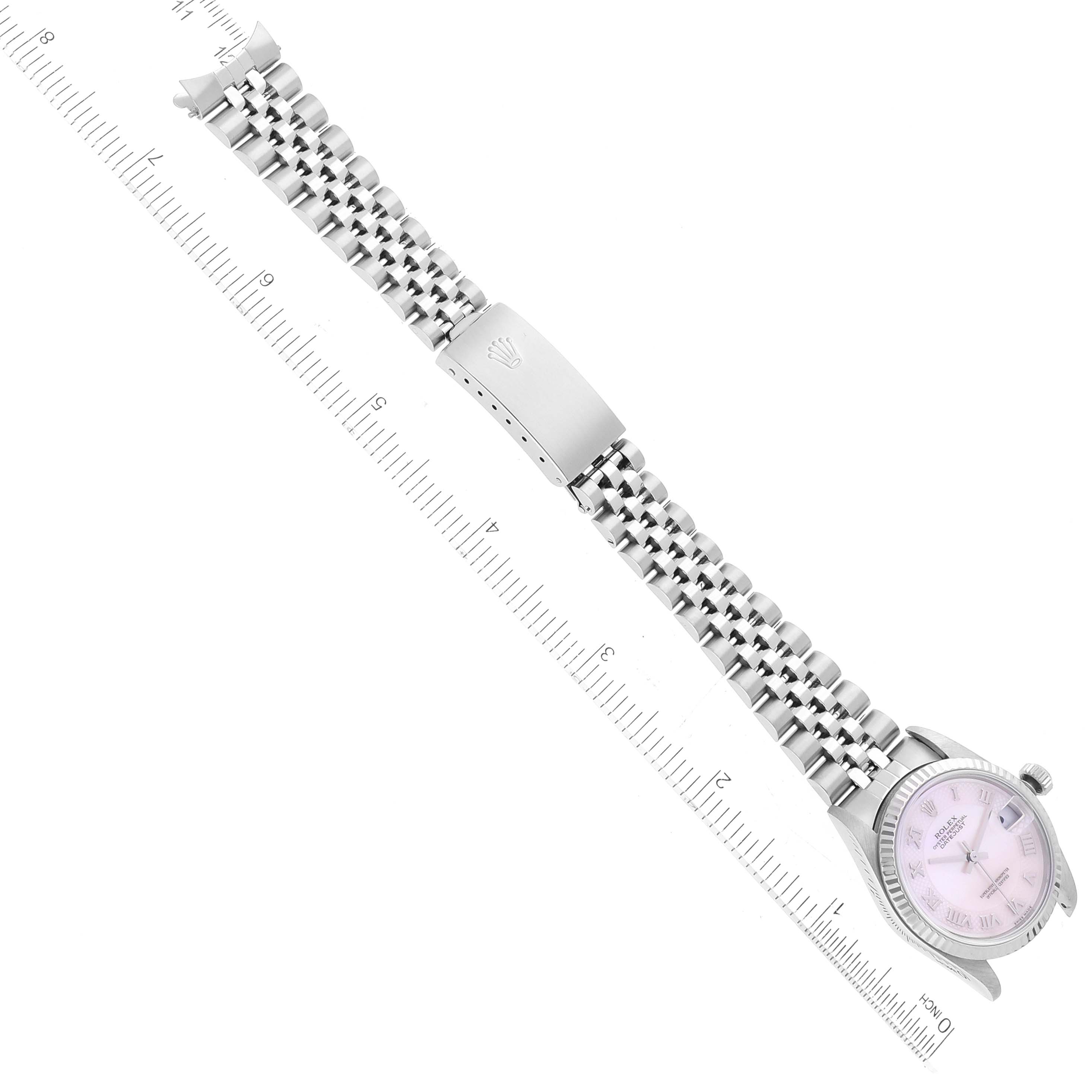 The image shows an overhead view of a Rolex Mid-Size 78274 Women's Stainless Steel Mother of Pearl Dial 78274 Women's Stainless Steel Mother of Pearl Dial model watch with a full bracelet and clasp, alongside a ruler.