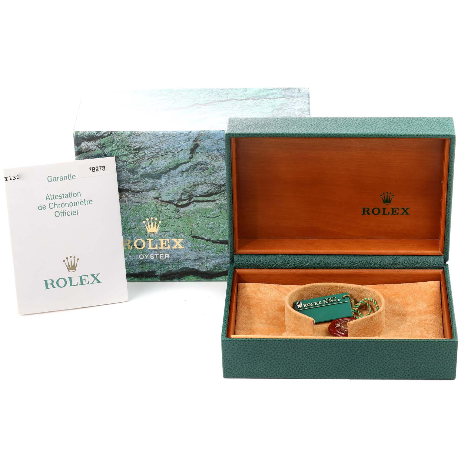 The image shows the packaging and accessories of a Rolex Mid-Size 78273 Women
s Steel and Gold (two tone) Silver Dial 78273 Women
s Steel and Gold (two tone) Silver Dial model, including the box, warranty card, and other documentation.