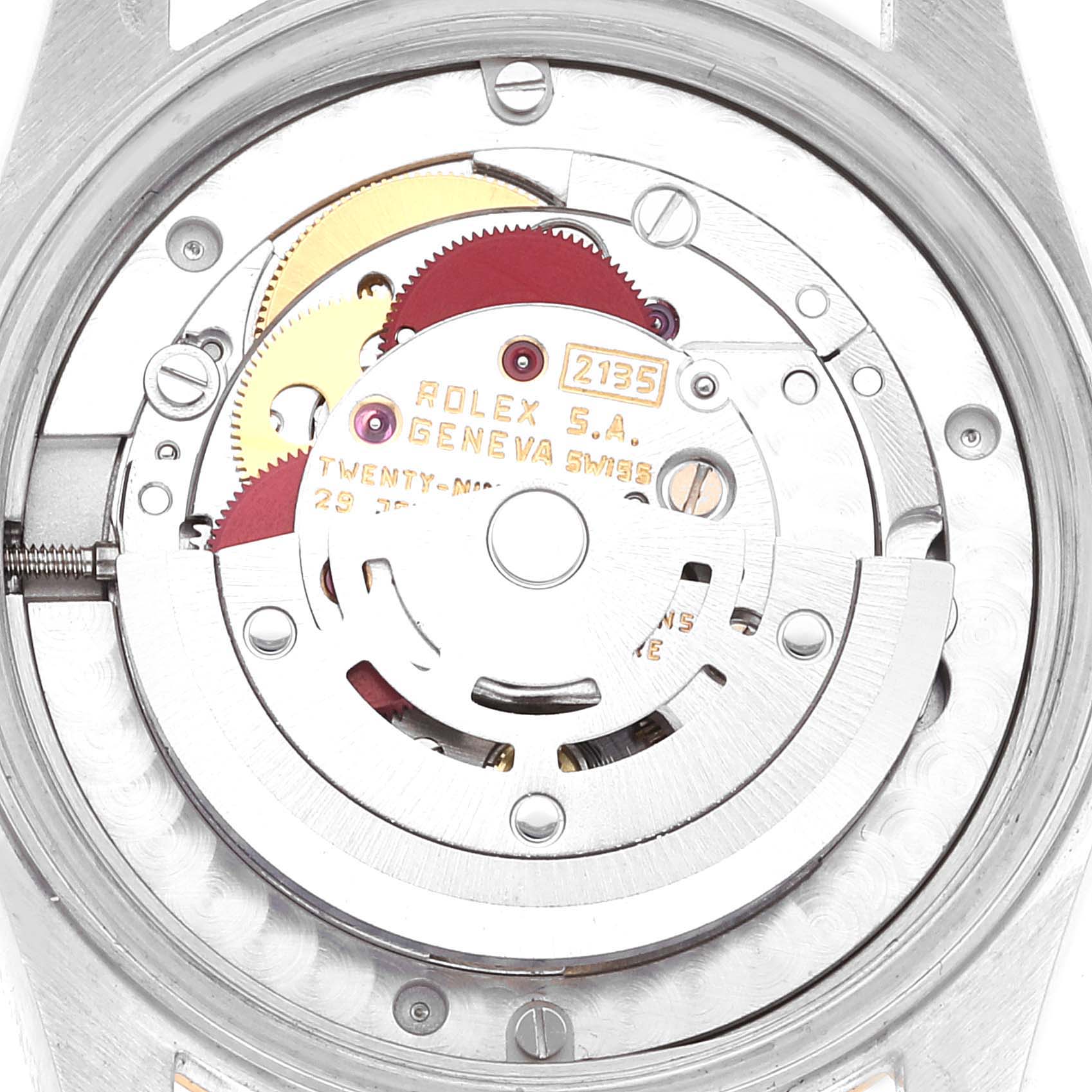This image shows the internal mechanical movement of a Mid-Size Rolex watch from a top-down angle.