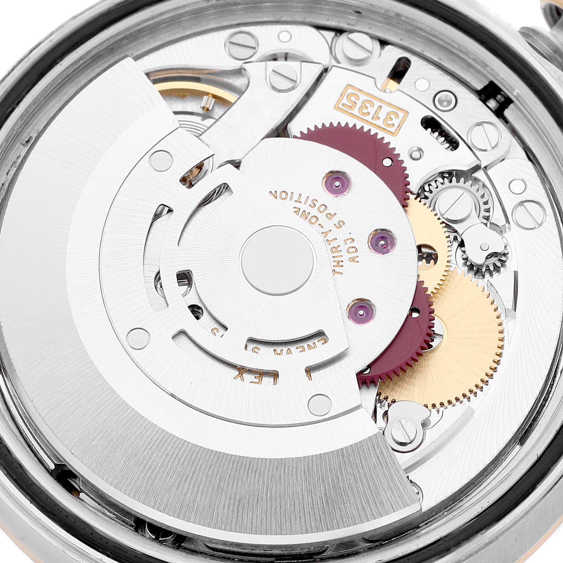 The image shows a close-up view of the mechanical movement inside the Rolex Datejust 16233 Men's Steel and Gold (two tone) Champagne Dial 16233 Men's Steel and Gold (two tone) Champagne Dial watch.