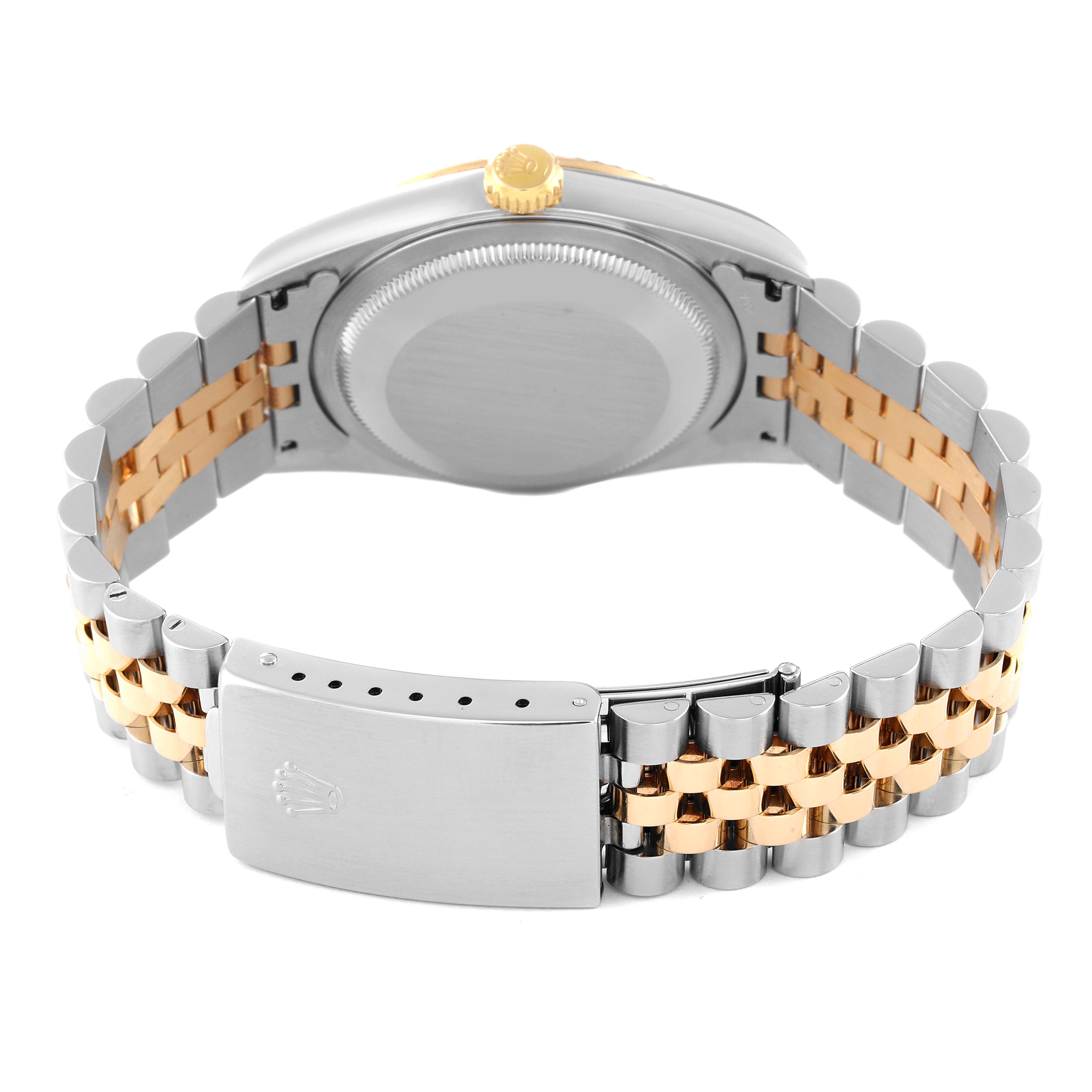 This image shows the back case, crown, and bracelet of a Rolex Datejust 16233 Men's Steel and Gold (two tone) Champagne Dial 16233 Men's Steel and Gold (two tone) Champagne Dial watch, viewed from the rear angle.