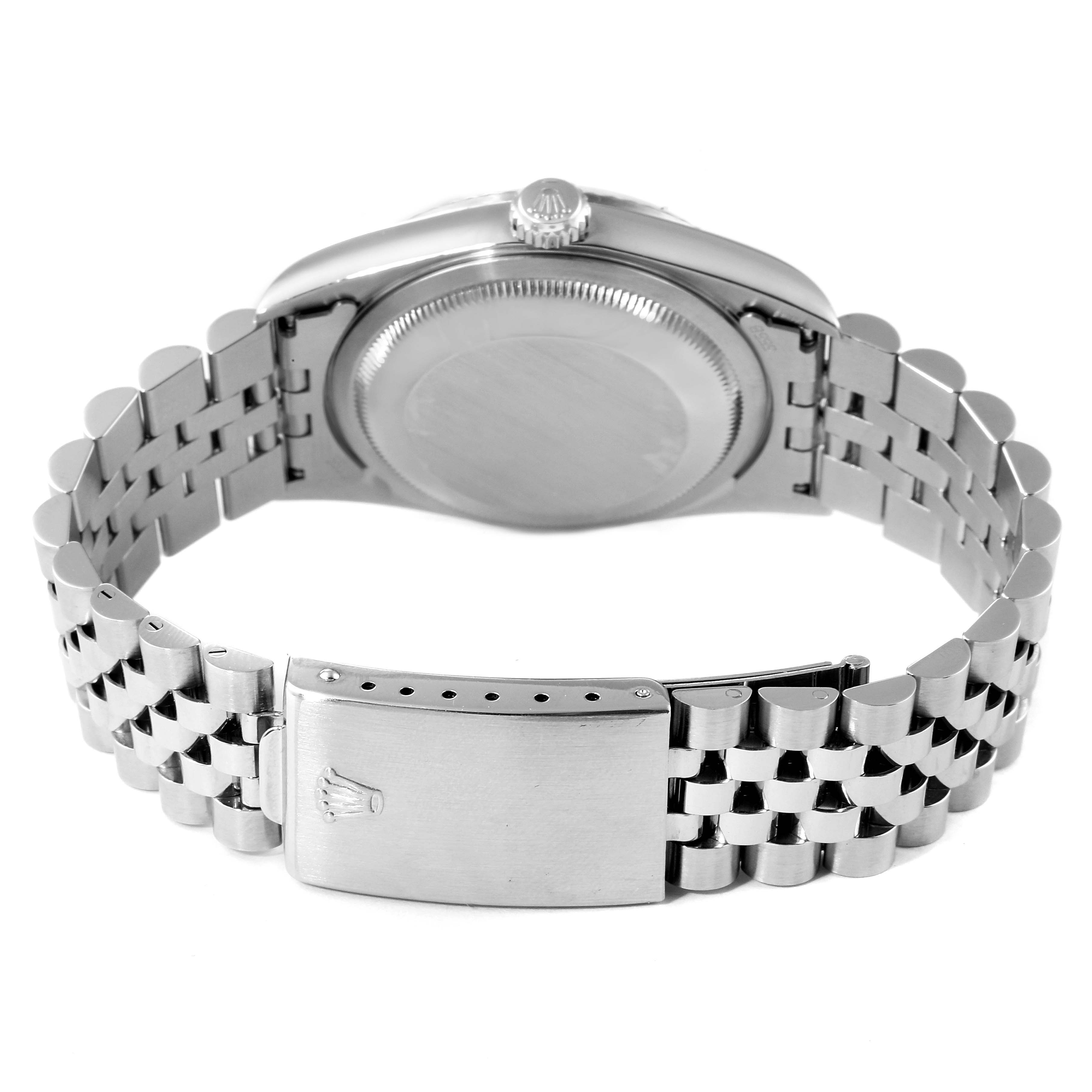 The image shows the back view of a Rolex Datejust 16234 Men
s Stainless Steel Black Dial 16234 Men
s Stainless Steel Black Dial watch, highlighting the case back, crown, and clasp of the bracelet.