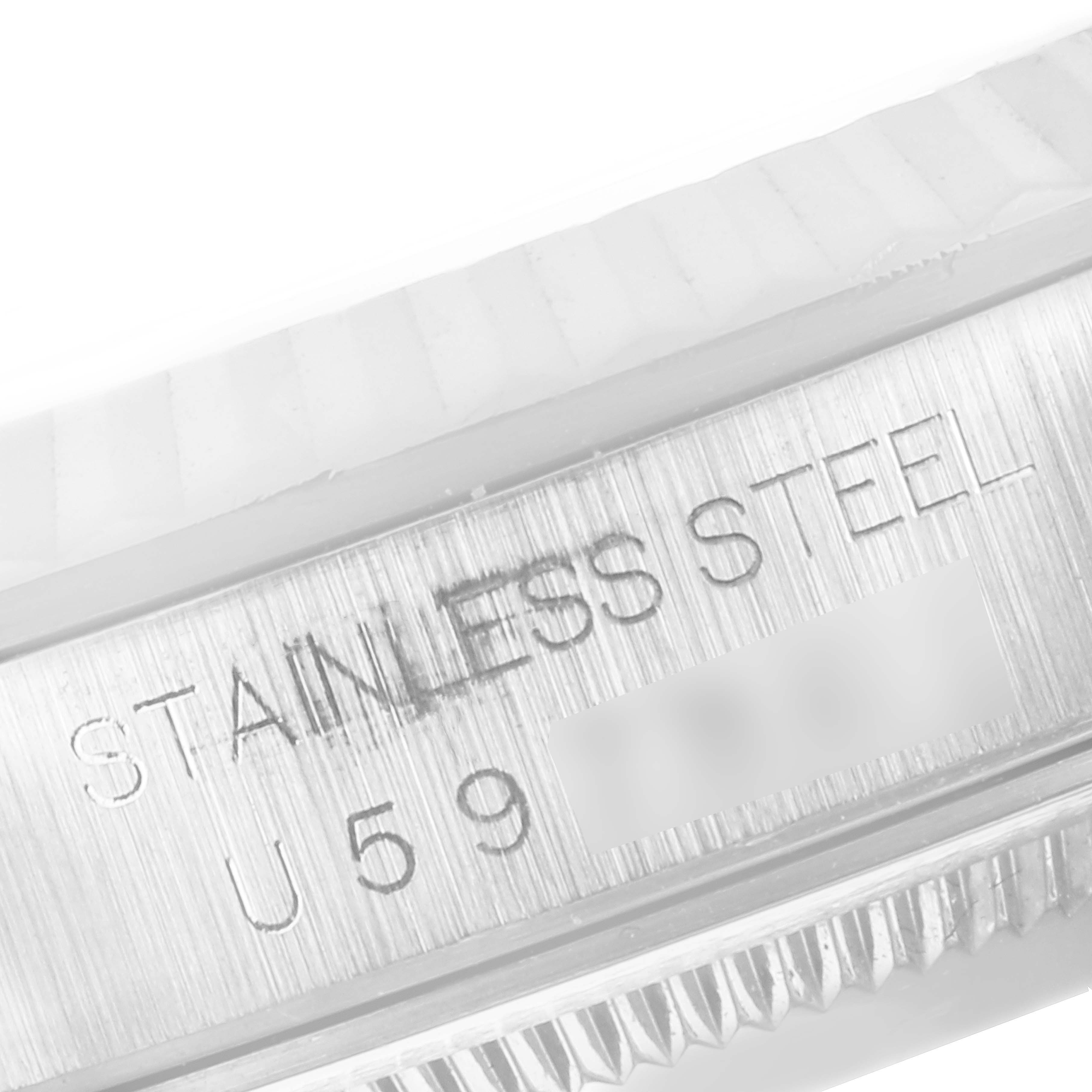 The image shows a close-up angle of the side of the Rolex Datejust 16234 Men
s Stainless Steel Black Dial 16234 Men
s Stainless Steel Black Dial, displaying the "STAINLESS STEEL" engraving.