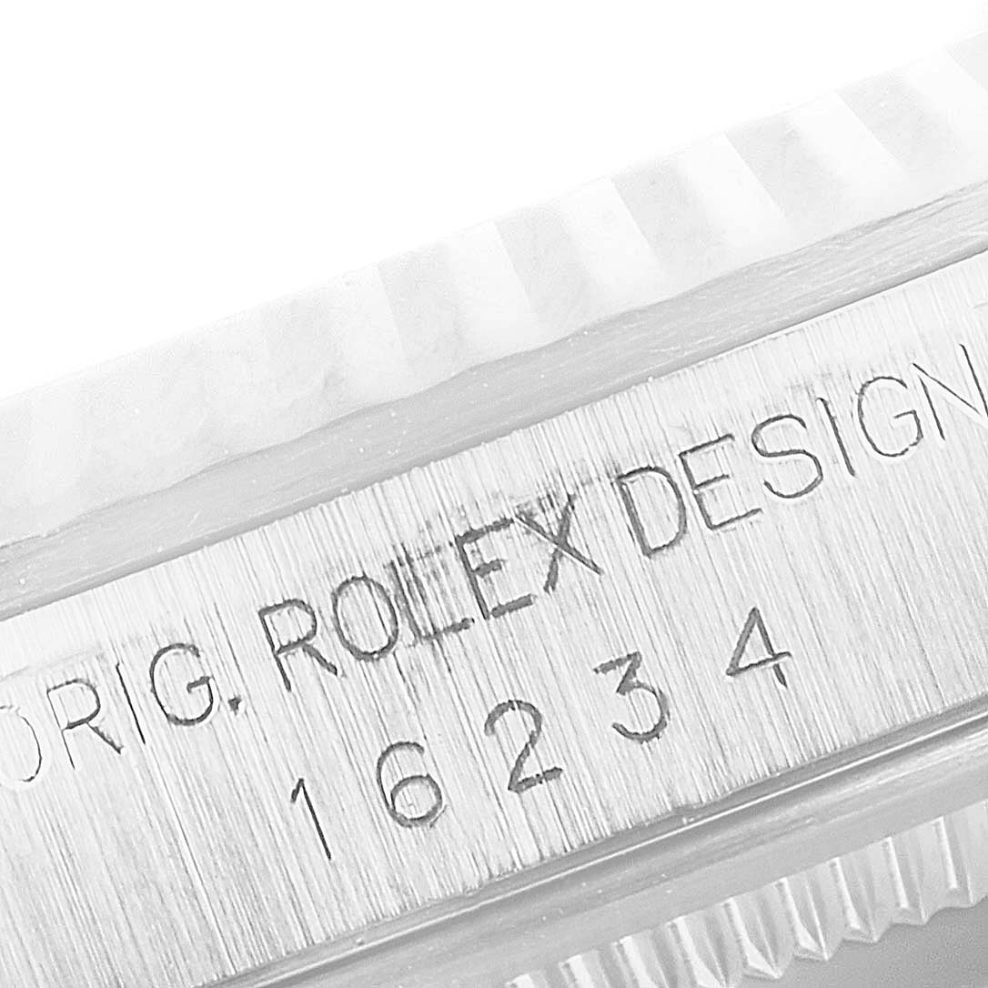 This close-up photo shows the side engraving on the case of a Rolex Datejust 16234 Men
s Stainless Steel Black Dial 16234 Men
s Stainless Steel Black Dial model, indicating the original design and model number.