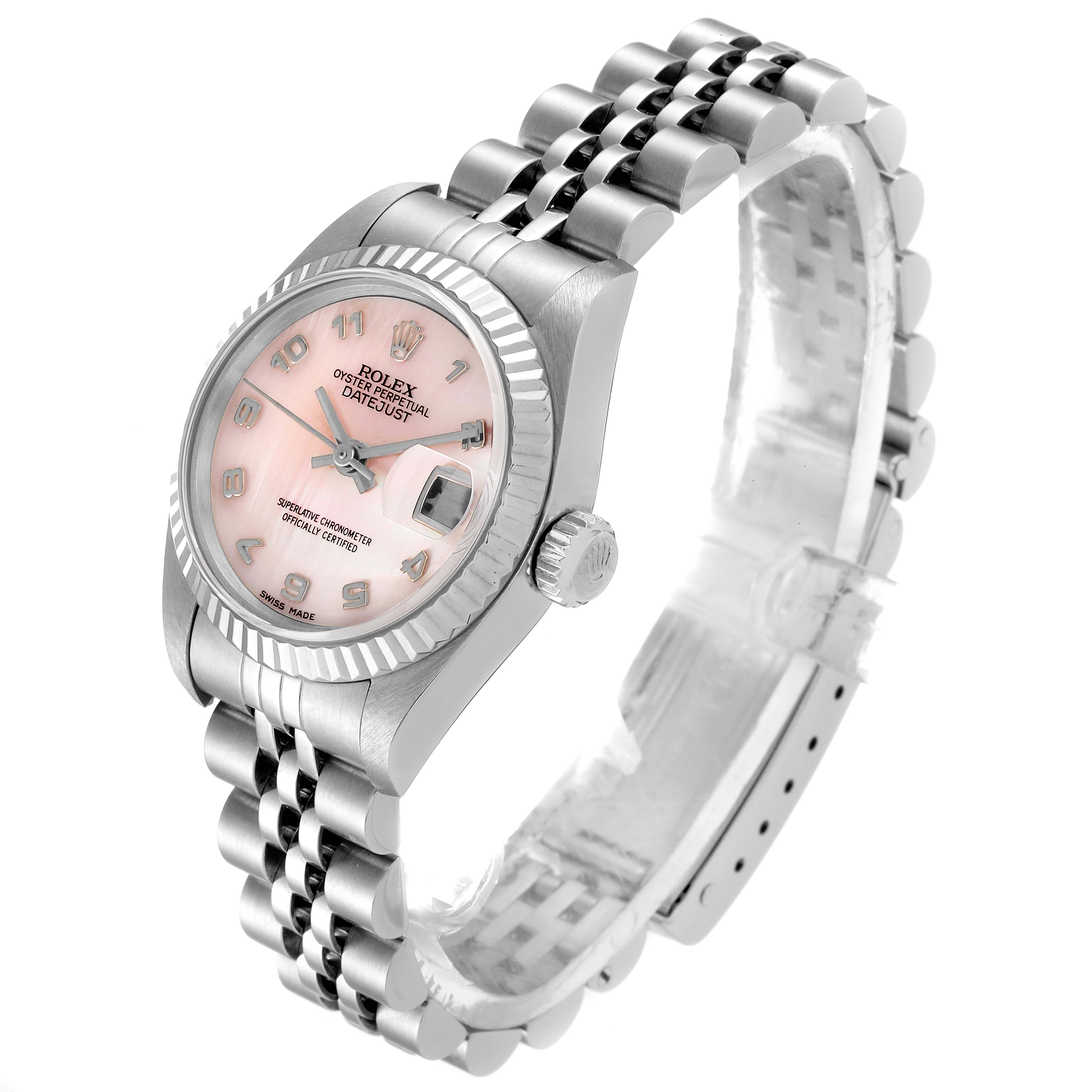 The Rolex Datejust 79174 Women
s Stainless Steel Mother of Pearl Dial 79174 Women
s Stainless Steel Mother of Pearl Dial watch is shown at a three-quarter angle, highlighting the dial, bezel, crown, and jubilee bracelet.