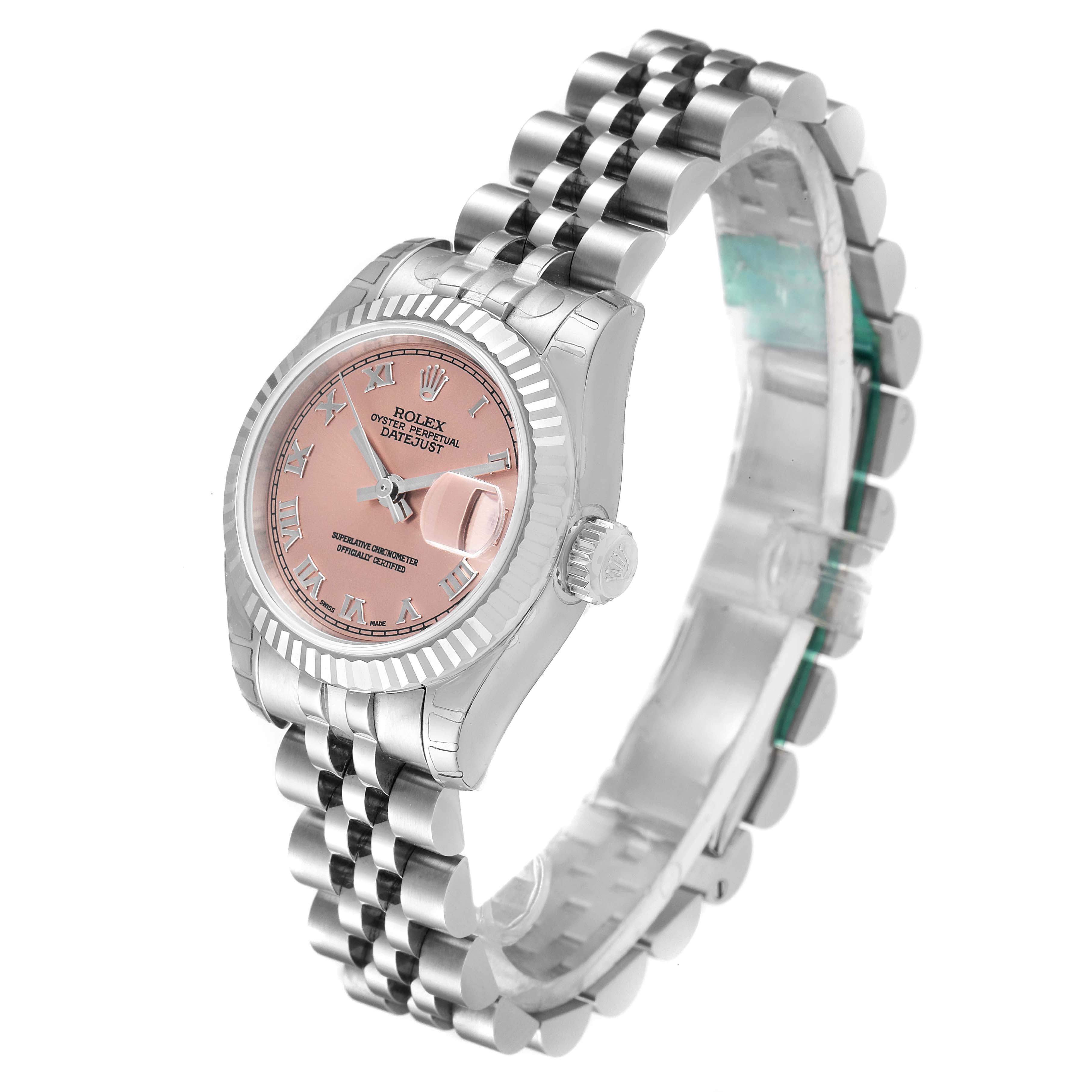 The image shows a Rolex Datejust 179174 Women's Stainless Steel Pink Dial 179174 Women's Stainless Steel Pink Dial watch from an angled side view, highlighting its pink dial, bezel, and jubilee bracelet.