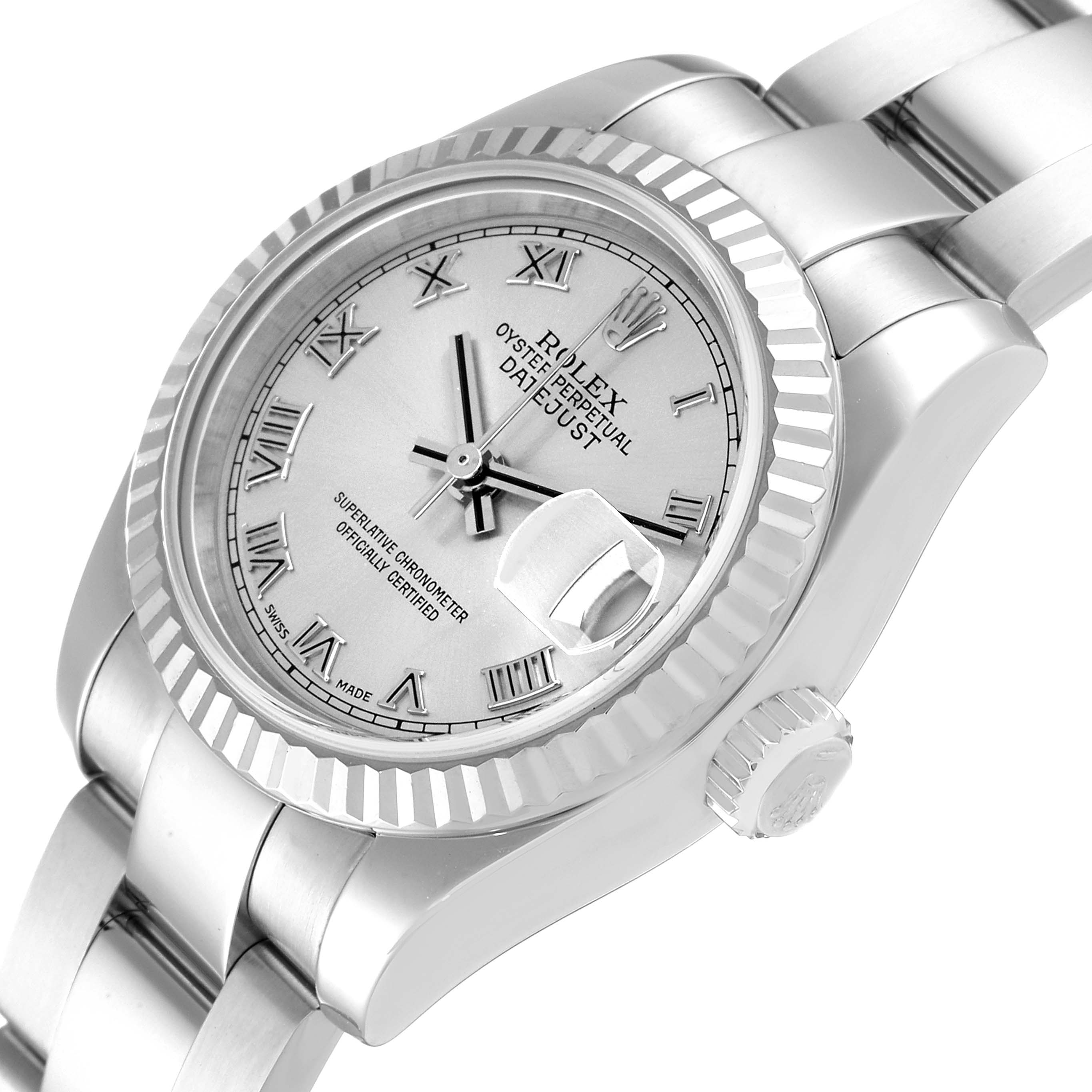 The image shows a close-up of the Rolex Datejust 179174 Women's Stainless Steel Silver Dial 179174 Women's Stainless Steel Silver Dial watch face, bezel, crown, and a portion of its bracelet.