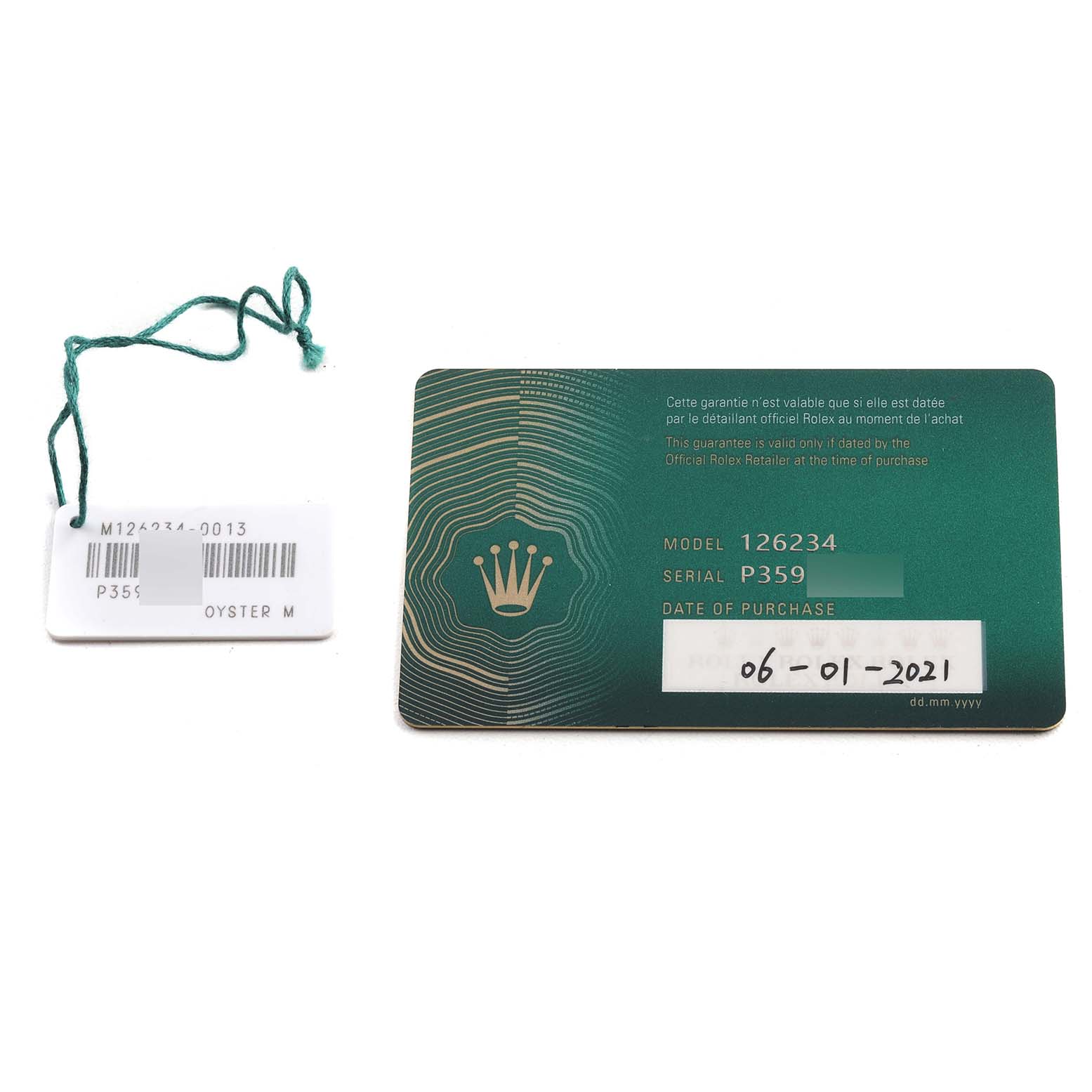 The image shows a warranty card and tag for a Rolex Datejust 126234 Men's Stainless Steel Silver Dial 126234 Men's Stainless Steel Silver Dial model.