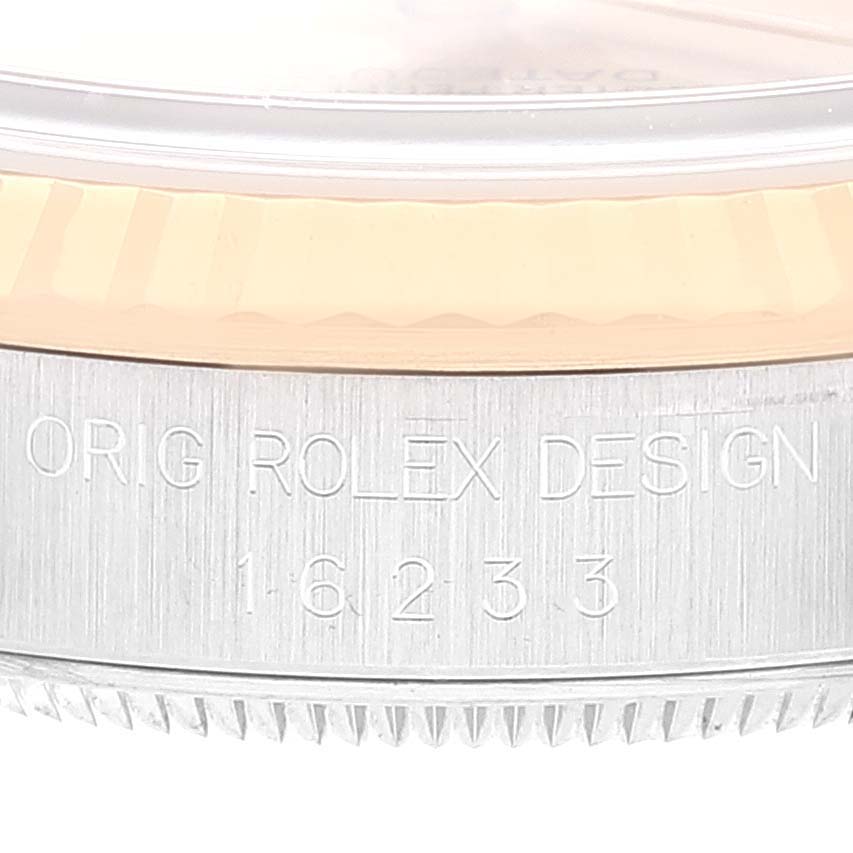 The image shows a close-up of the side case of a Rolex Datejust 16233 Men's Steel and Gold (two tone) Champagne Dial 16233 Men's Steel and Gold (two tone) Champagne Dial model, highlighting the "ORIG ROLEX DESIGN" engraving and model number.