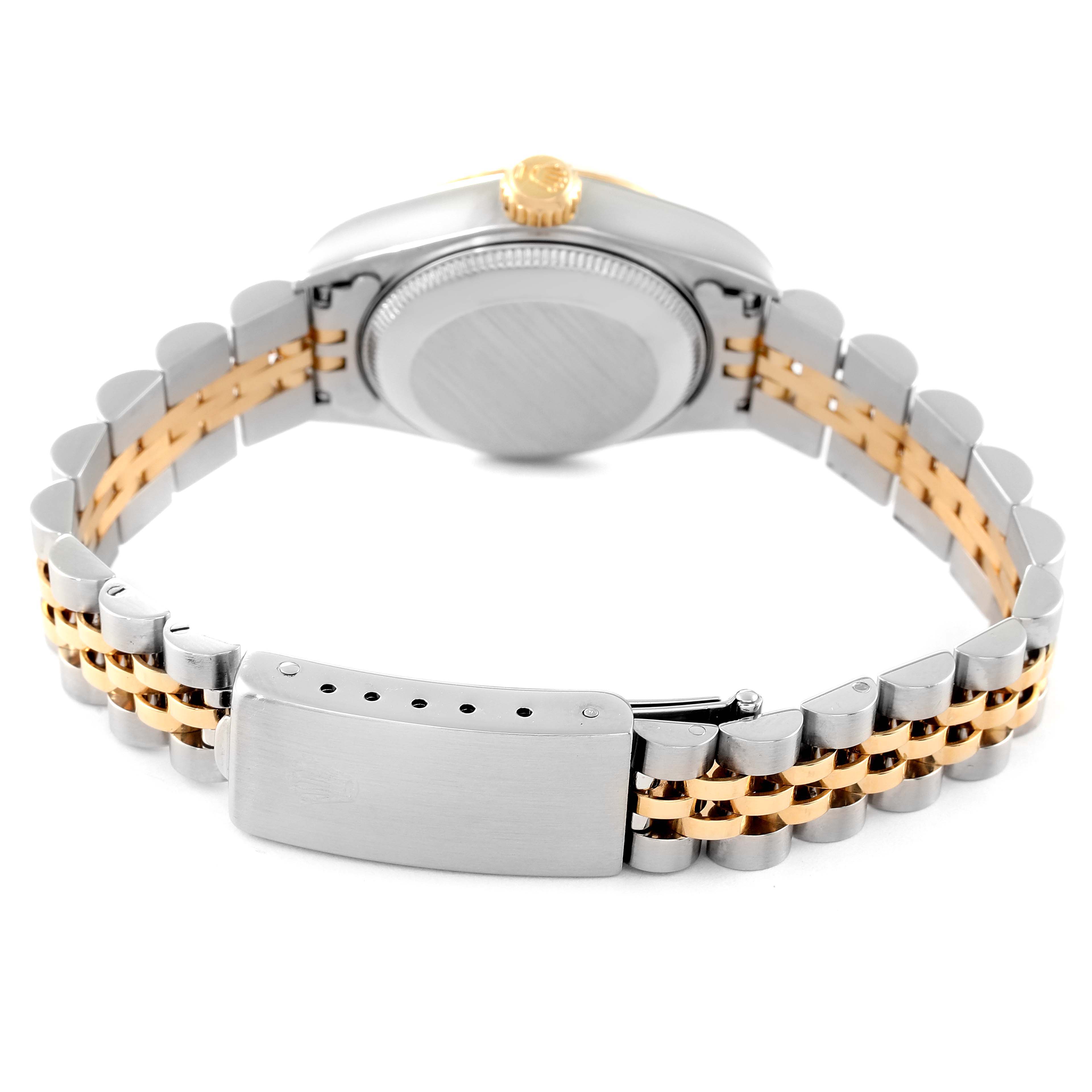 The image shows the back view of a Rolex Datejust 69173 Women
s Steel and Gold (two tone) White Dial 69173 Women
s Steel and Gold (two tone) White Dial watch, highlighting the two-tone bracelet and closed clasp.