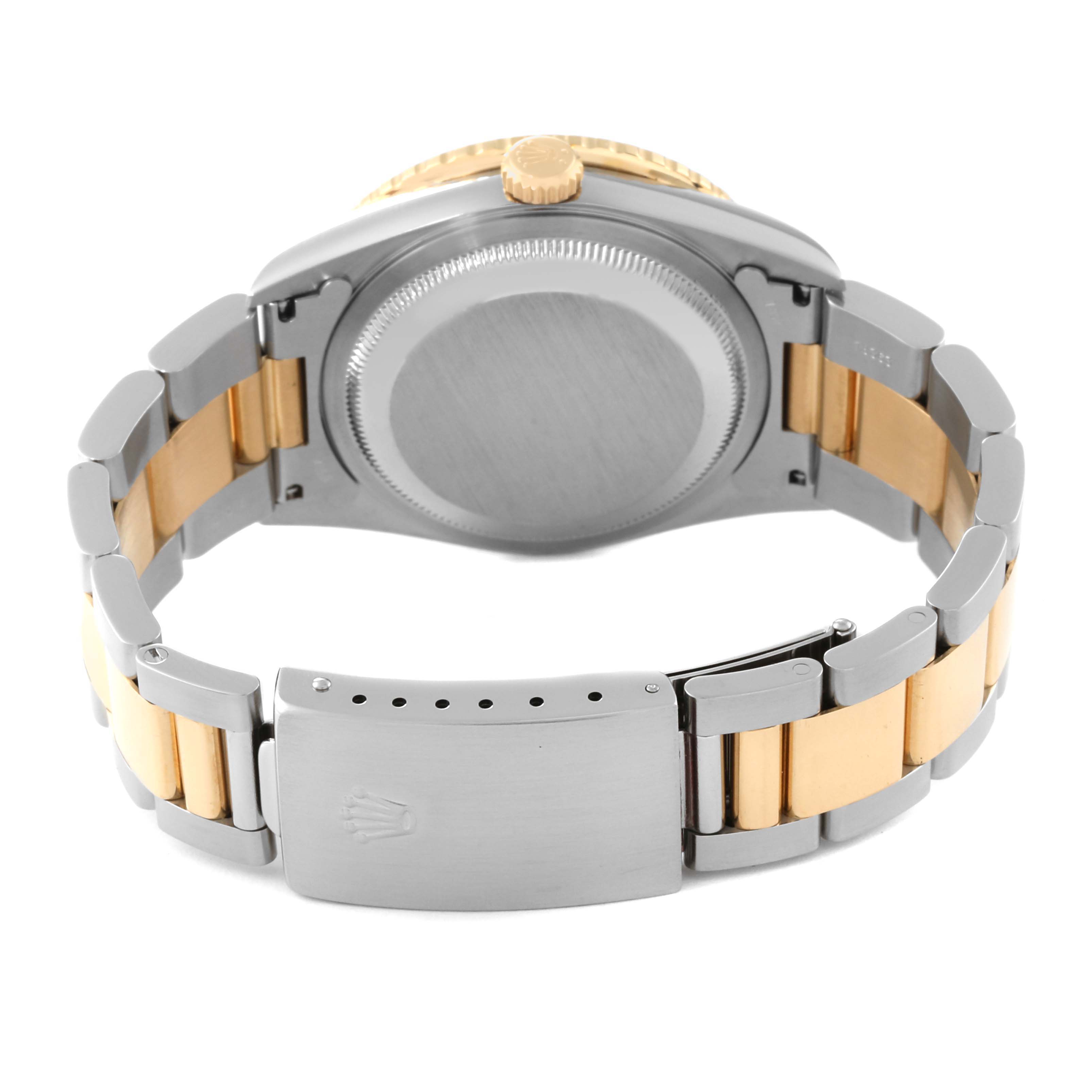 The image shows the back view of the Rolex Turn-o-Graph 16263 Men's Steel and Gold (two tone) Blue Dial 16263 Men's Steel and Gold (two tone) Blue Dial watch, highlighting its clasp, stainless steel and gold bracelet, and case back.