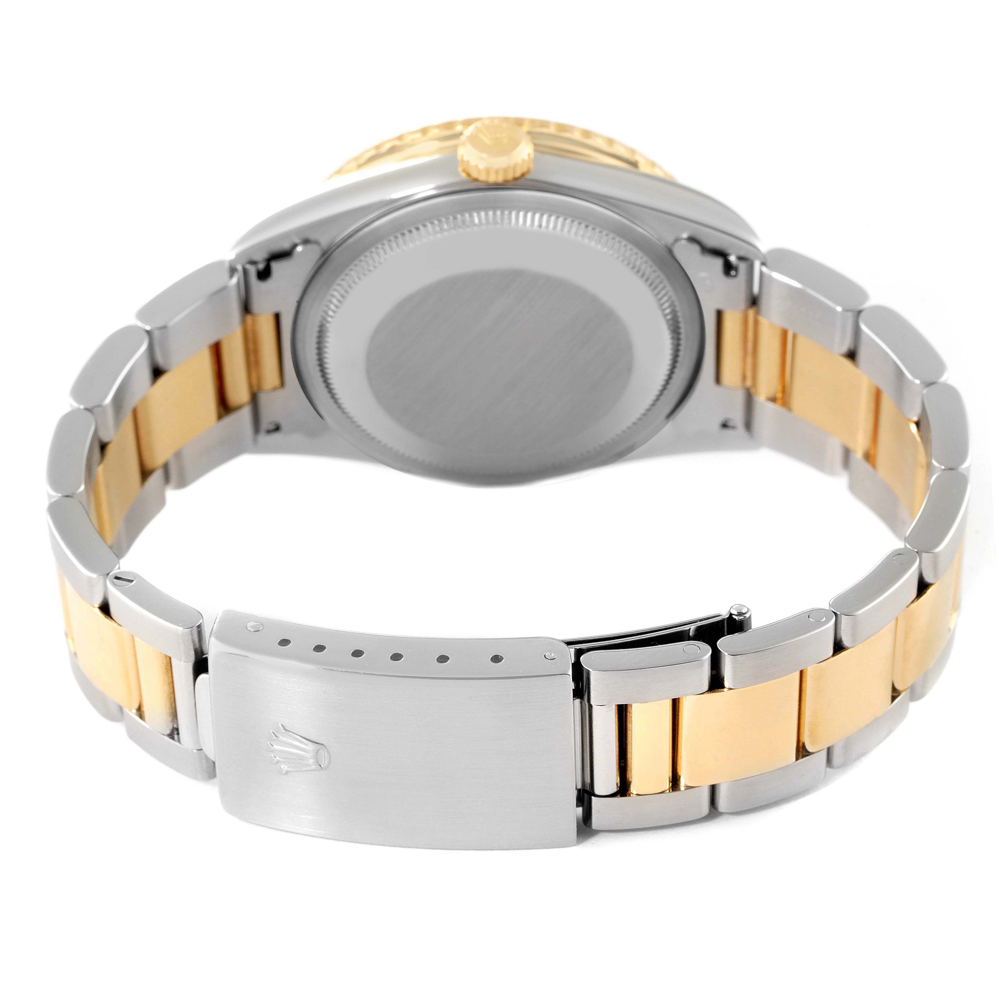 This image shows the back case and bracelet of a Rolex Turn-o-Graph 16263 Men
s Steel and Gold (two tone) Black Dial 16263 Men
s Steel and Gold (two tone) Black Dial watch, featuring a two-tone metal design.
