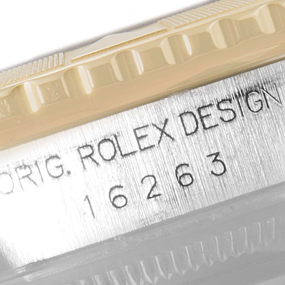 The image shows a close-up of the case side and bezel of a Rolex Turn-o-Graph 16263 Men
s Steel and Gold (two tone) Black Dial 16263 Men
s Steel and Gold (two tone) Black Dial model, displaying the engraved design number.