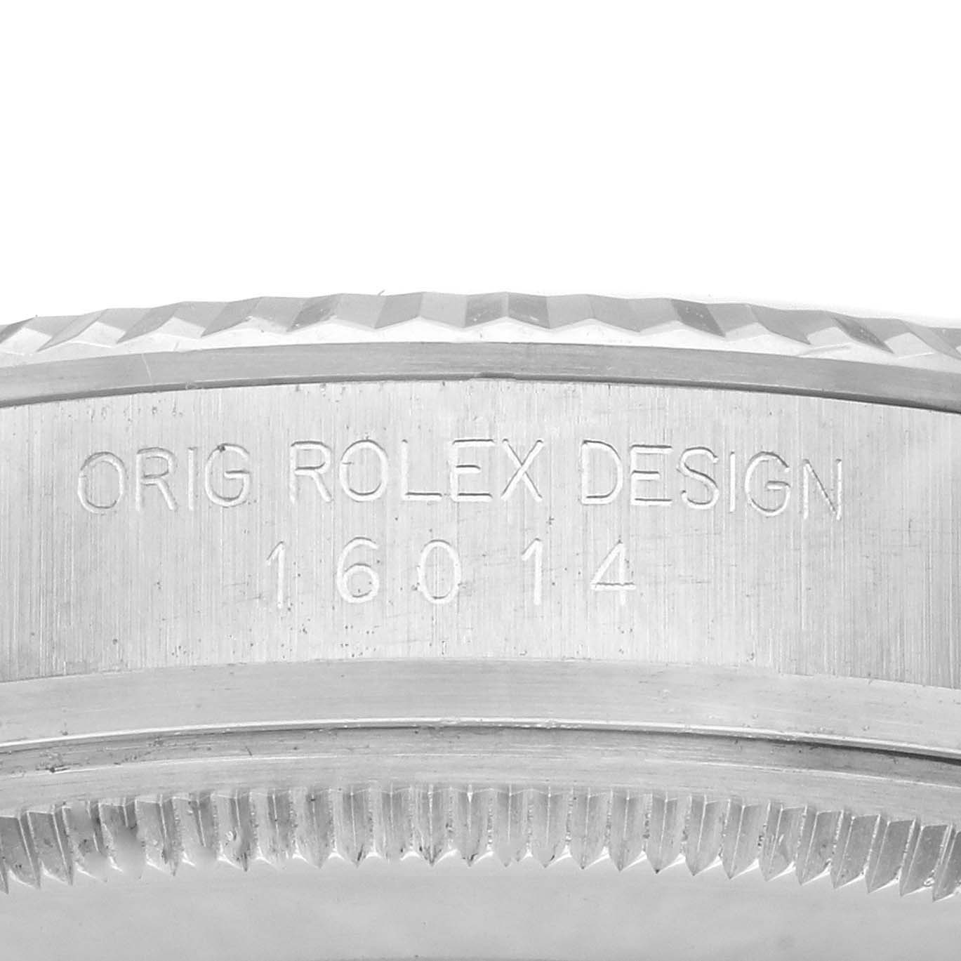 The image shows a close-up of the side and edge of the bezel of a Rolex Datejust 16014 Men's Stainless Steel Black Dial 16014 Men's Stainless Steel Black Dial watch, displaying the model number engraving.