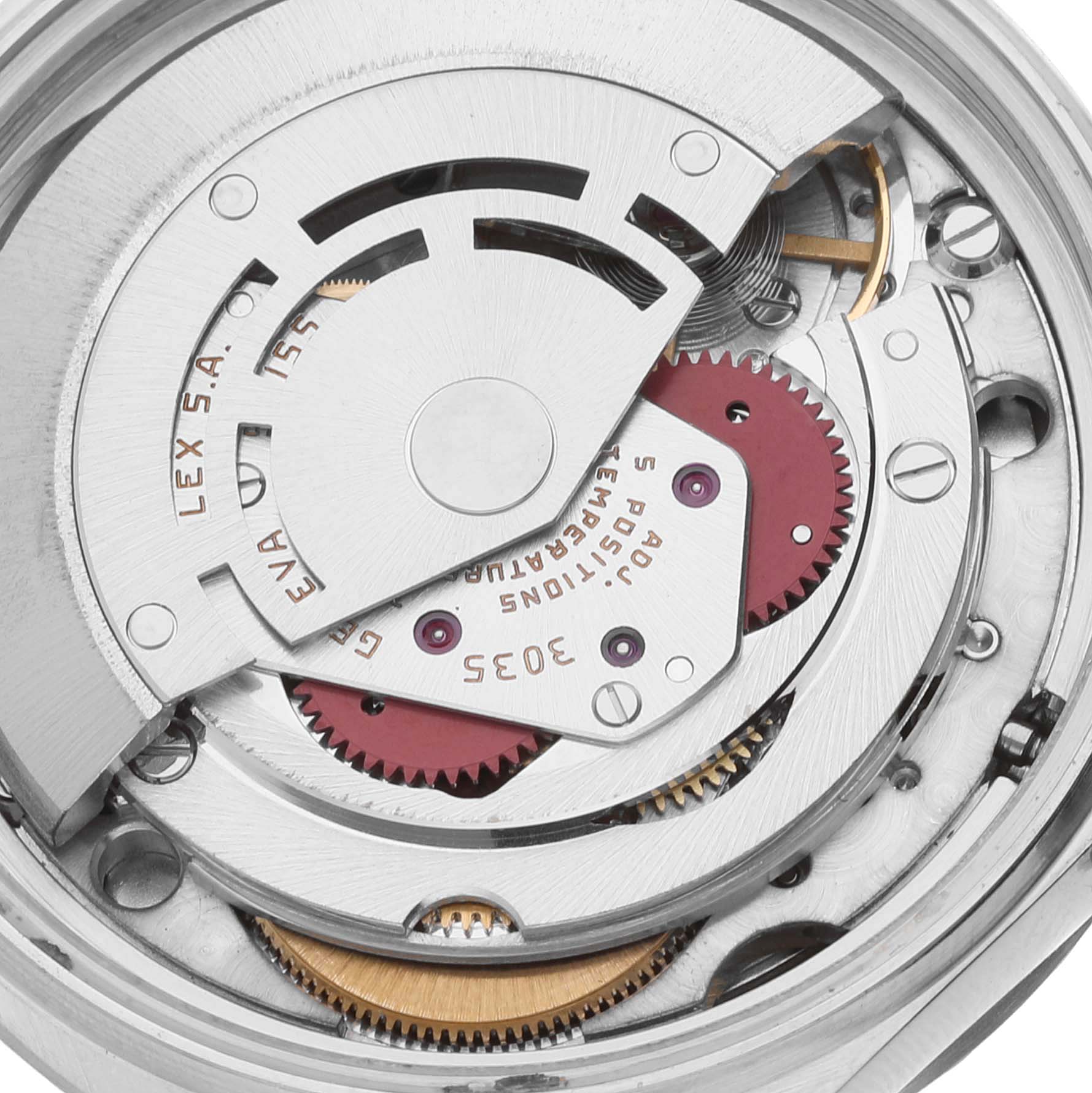 This image shows the intricate inner mechanism of a Rolex Datejust 16030 Men's Stainless Steel White Dial 16030 Men's Stainless Steel White Dial watch, including gears and components of the movement.
