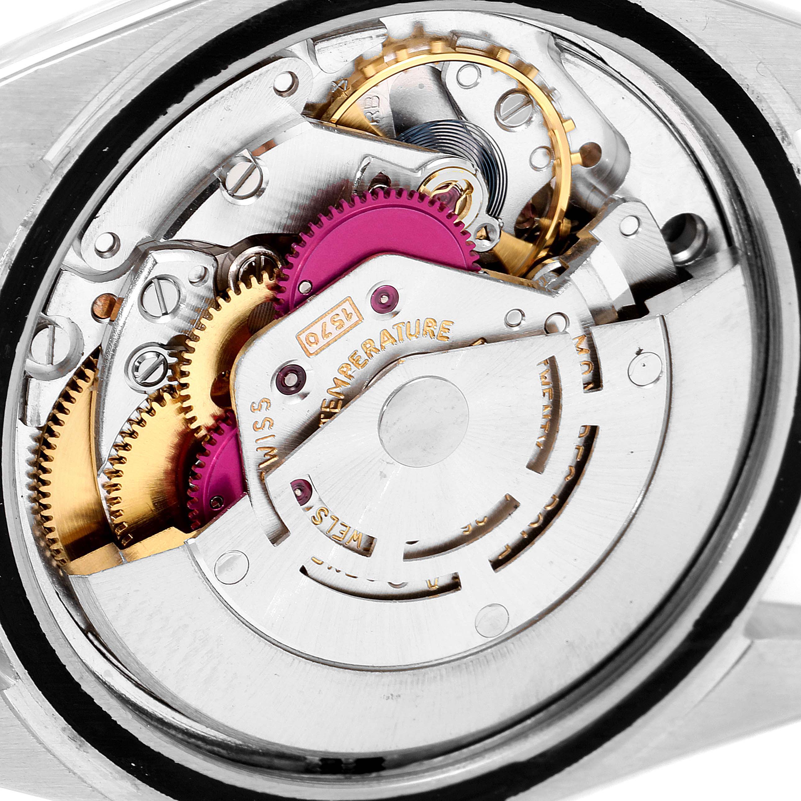 This image shows the internal mechanical movement of the Rolex Vintage Collection 1016 Men's Stainless Steel Black Dial 1016 Men's Stainless Steel Black Dial watch, capturing gears and intricate components.