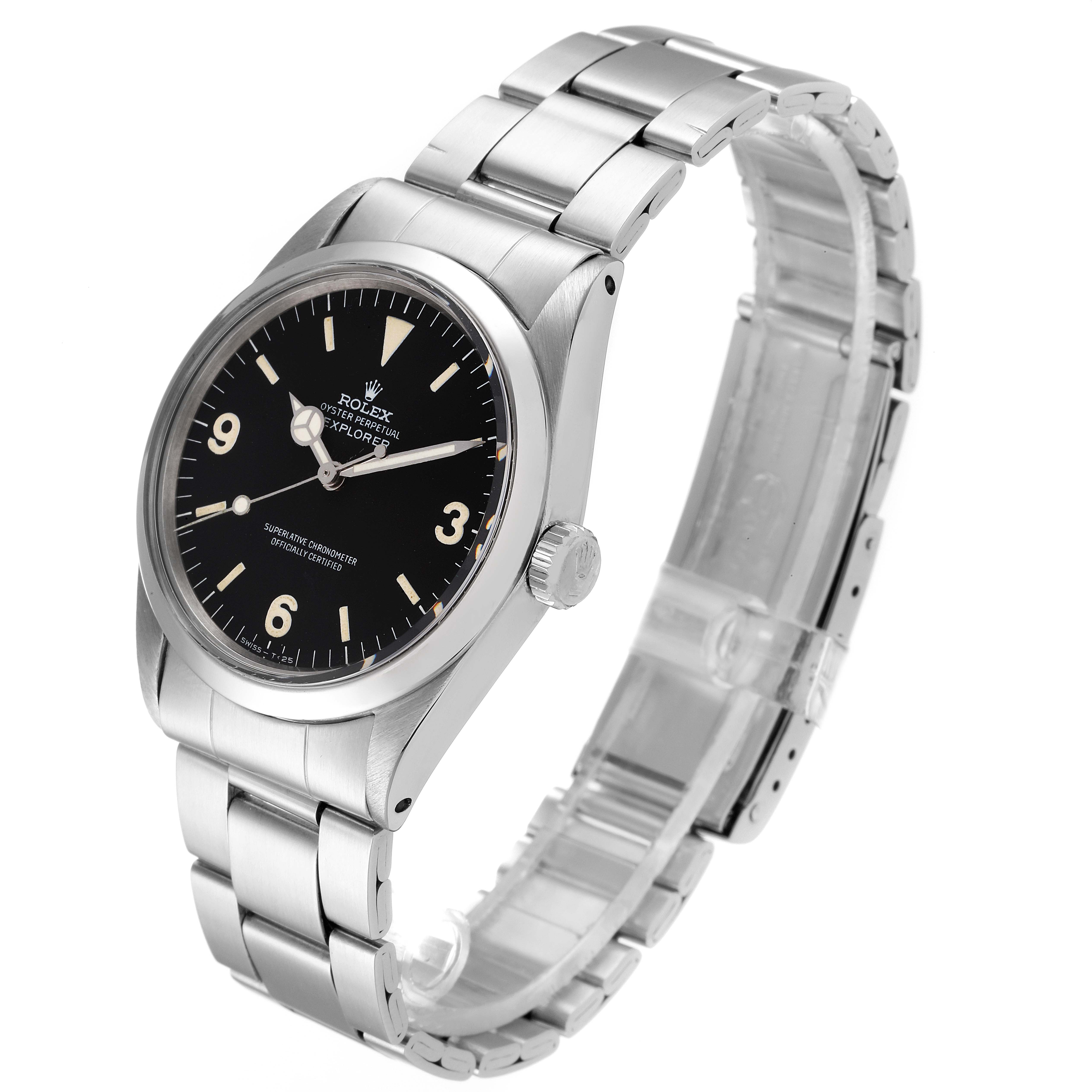 The Vintage Collection Rolex watch is shown at a slight angle, displaying the face, crown, and metal bracelet.