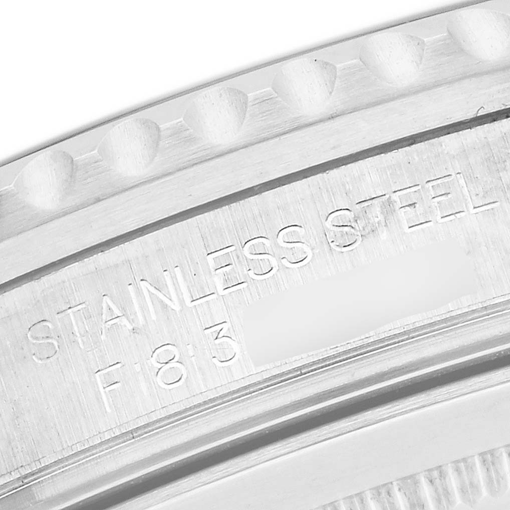 This image shows a close-up of the case back engraving on a Rolex GMT-Master 16710 Men's Stainless Steel Black Dial 16710 Men's Stainless Steel Black Dial watch, highlighting the "Stainless Steel" inscription.