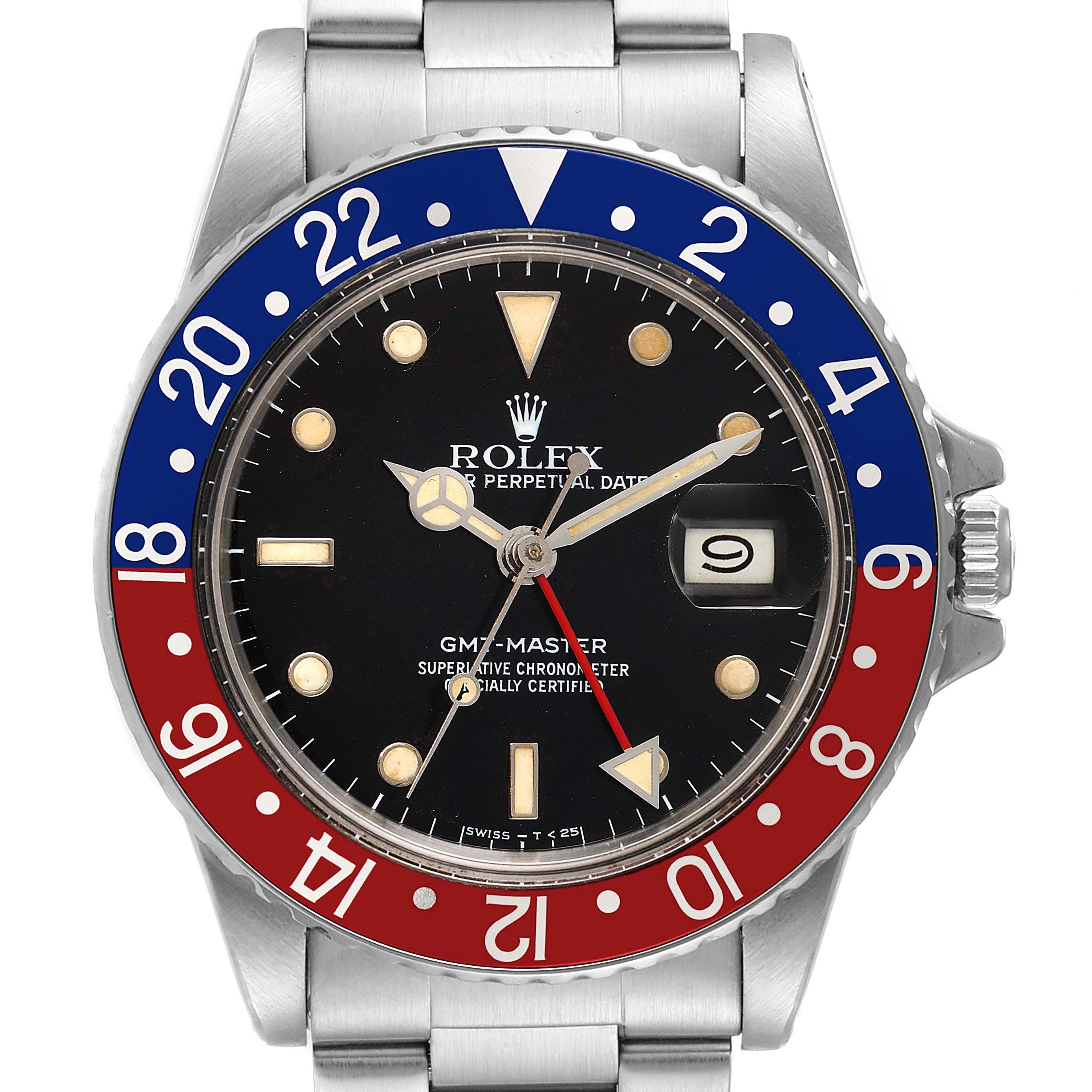This image shows the face and bezel of a Vintage Collection Rolex GMT-Master watch, including the hour, minute, and second hands.