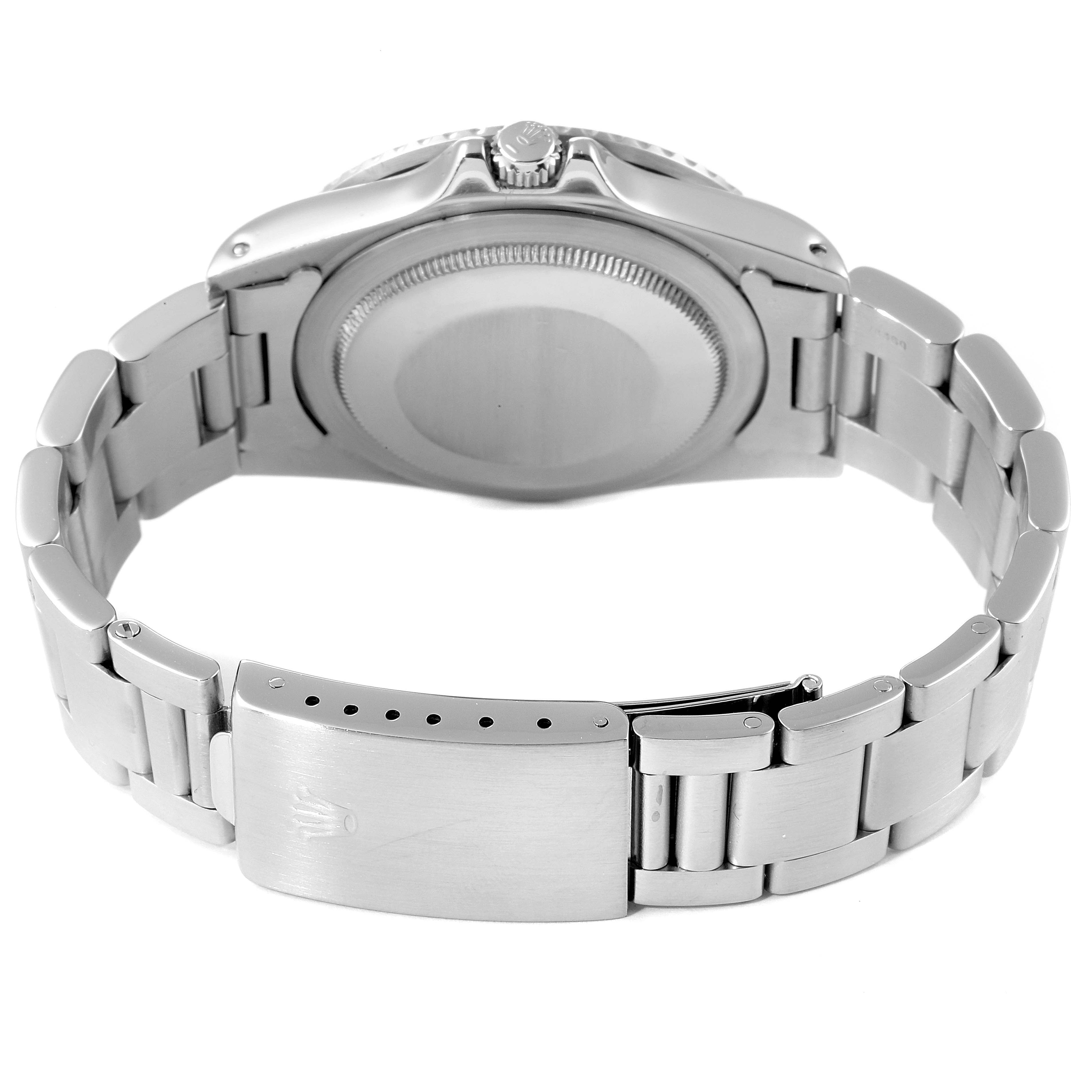 The image shows the back view of a Vintage Collection Rolex watch, highlighting the clasp, bracelet, and case back.