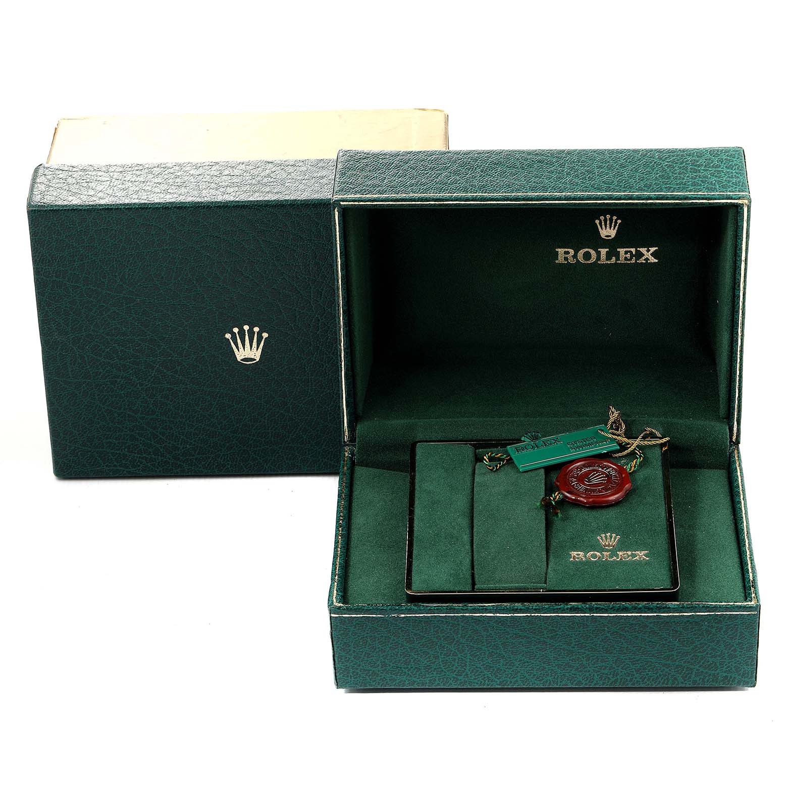 The image shows the open box and packaging of a Vintage Collection model by Rolex, with tags and accessories inside.