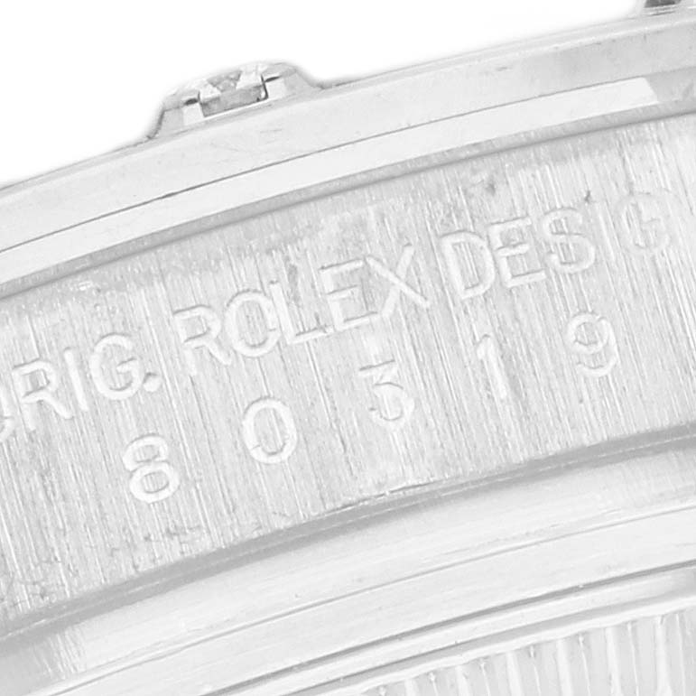 This close-up image shows the side engraving of the bezel on a Rolex Pearlmaster 80319 Women's White Gold Mother of Pearl Dial 80319 Women's White Gold Mother of Pearl Dial watch.
