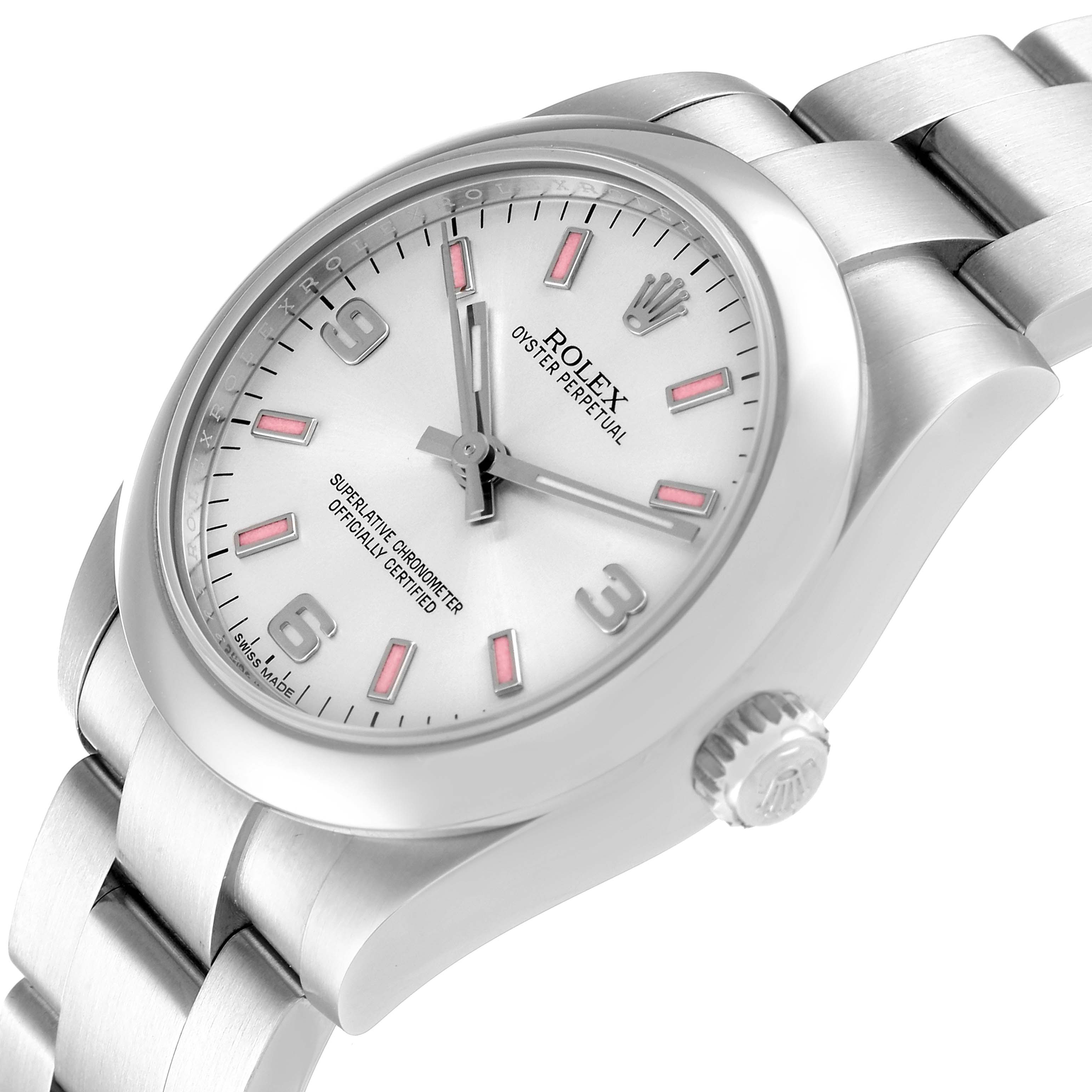 The image shows a tilted view of a Rolex Mid-Size 177200 Women
s Stainless Steel Silver Dial 177200 Women
s Stainless Steel Silver Dial Oyster Perpetual watch, highlighting the face, bezel, and part of the bracelet.
