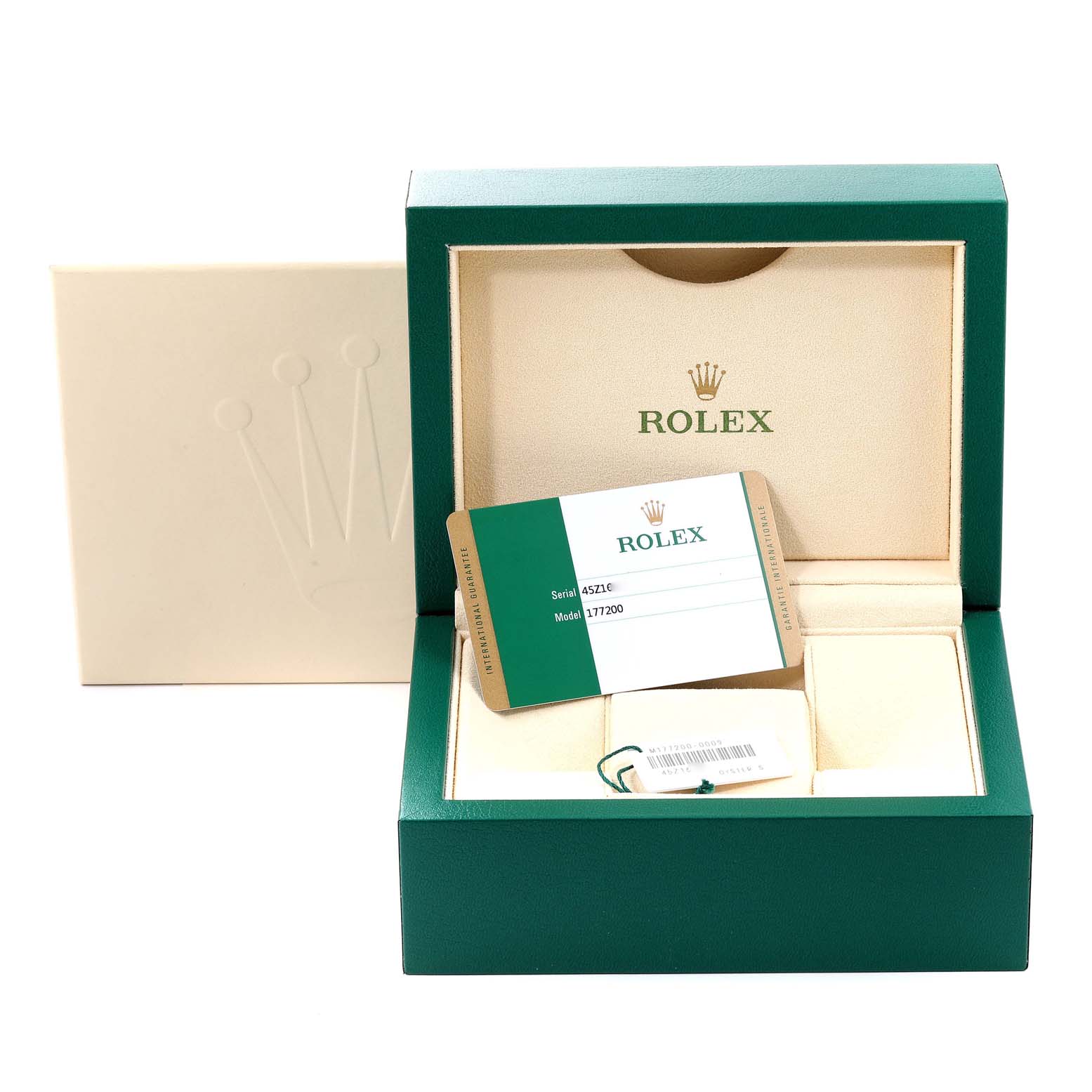 The image shows a Rolex Mid-Size 177200 Women
s Stainless Steel Silver Dial 177200 Women
s Stainless Steel Silver Dial watch box and accessories, including a warranty card and a tag, all viewed from the front.