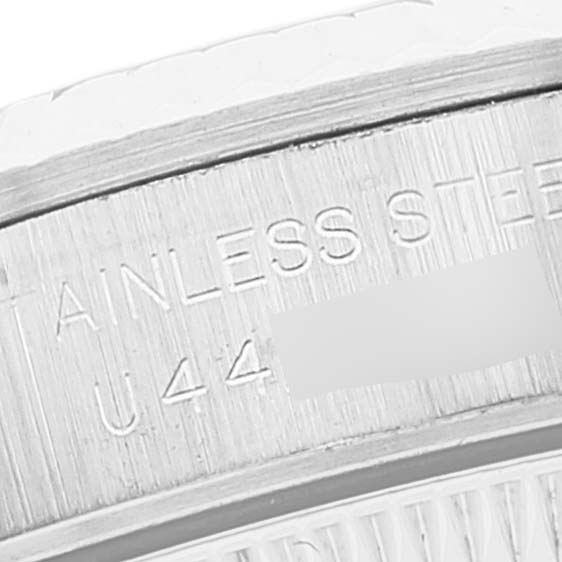 This image shows a close-up of the engravings on the stainless steel case of a Rolex Datejust 67194 Women
s Stainless Steel Silver Dial 67194 Women
s Stainless Steel Silver Dial watch.