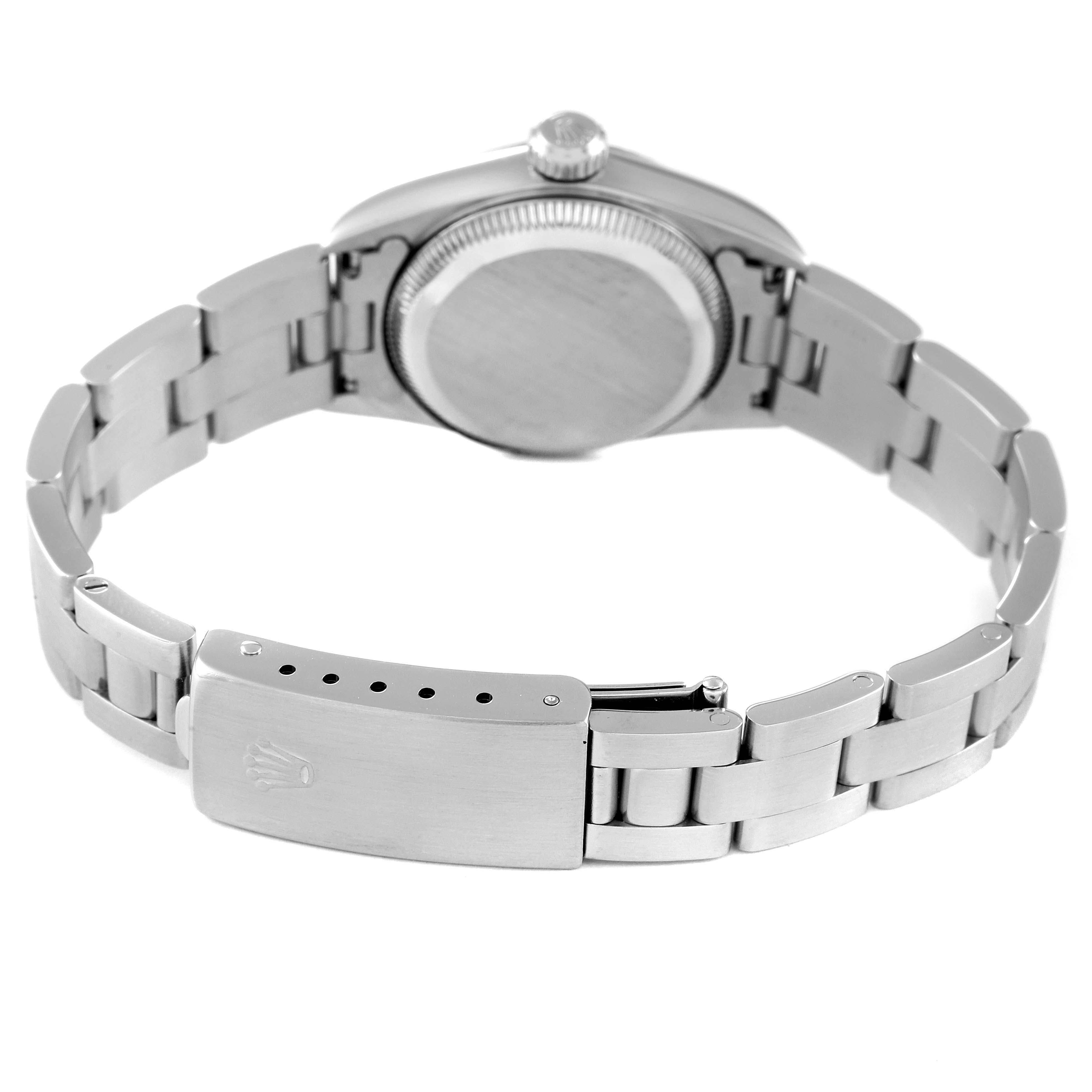 The image shows the backside of a Rolex Datejust 67194 Women
s Stainless Steel Silver Dial 67194 Women
s Stainless Steel Silver Dial watch, highlighting its clasp and bracelet.